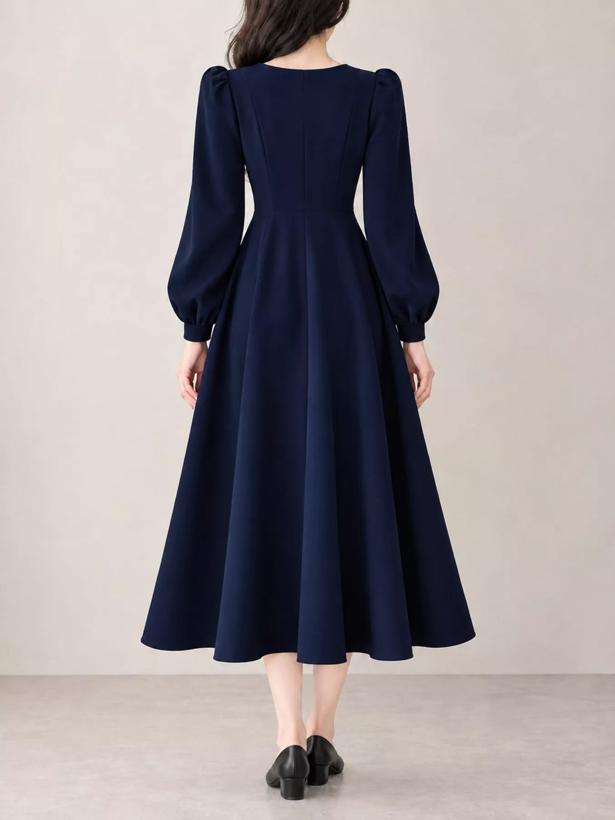 Navy long sleeve a line midi dress, back view