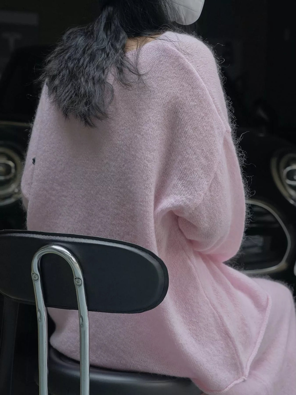 Pink round neck sweater, back view
