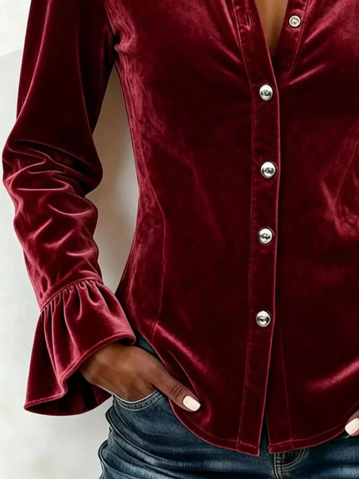 Burgundy velvet flounce-sleeve shirt, button and cuff detail