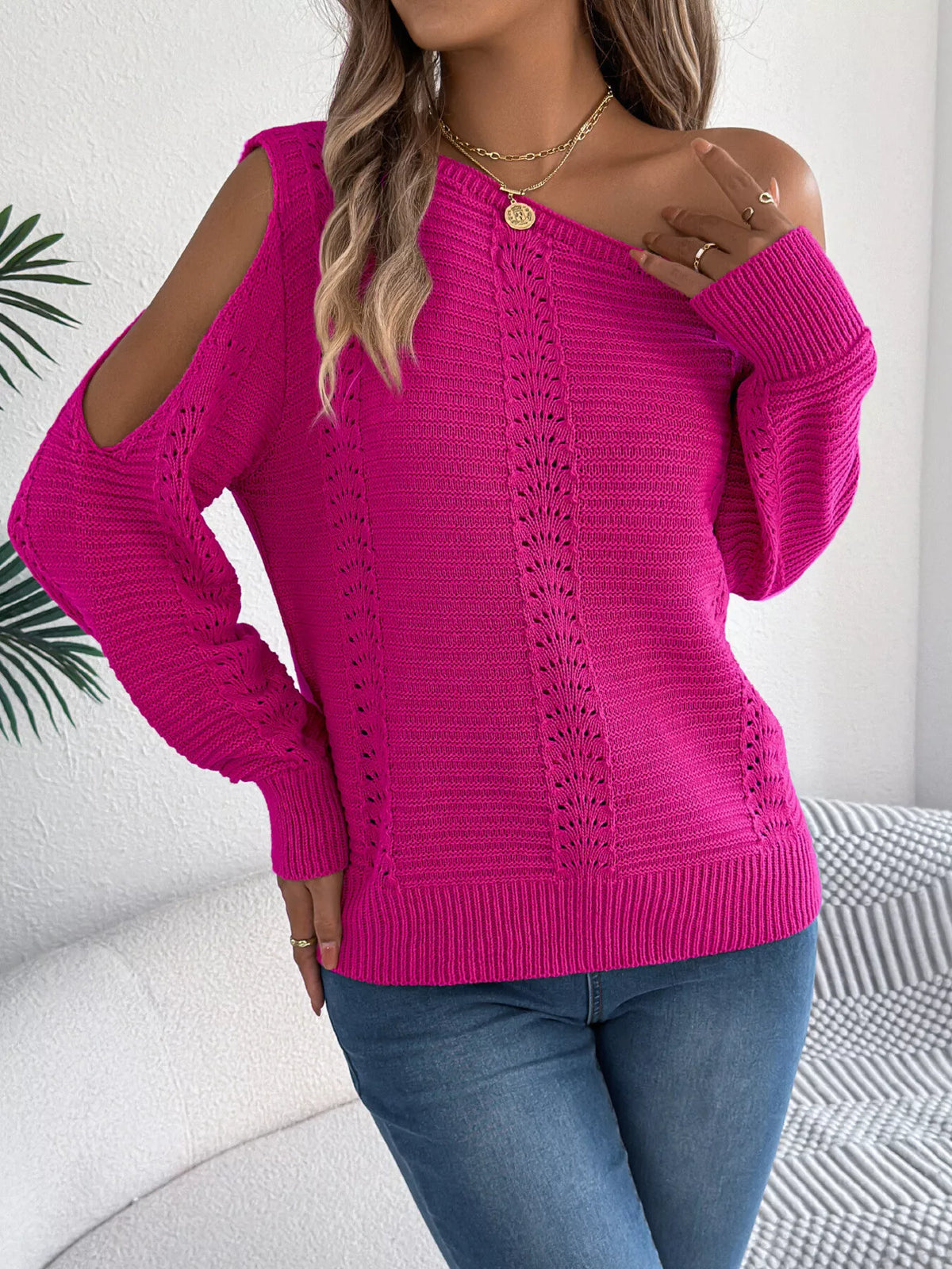 Cerise cold-shoulder openwork knit sweater, front view with cold-shoulder cutout.