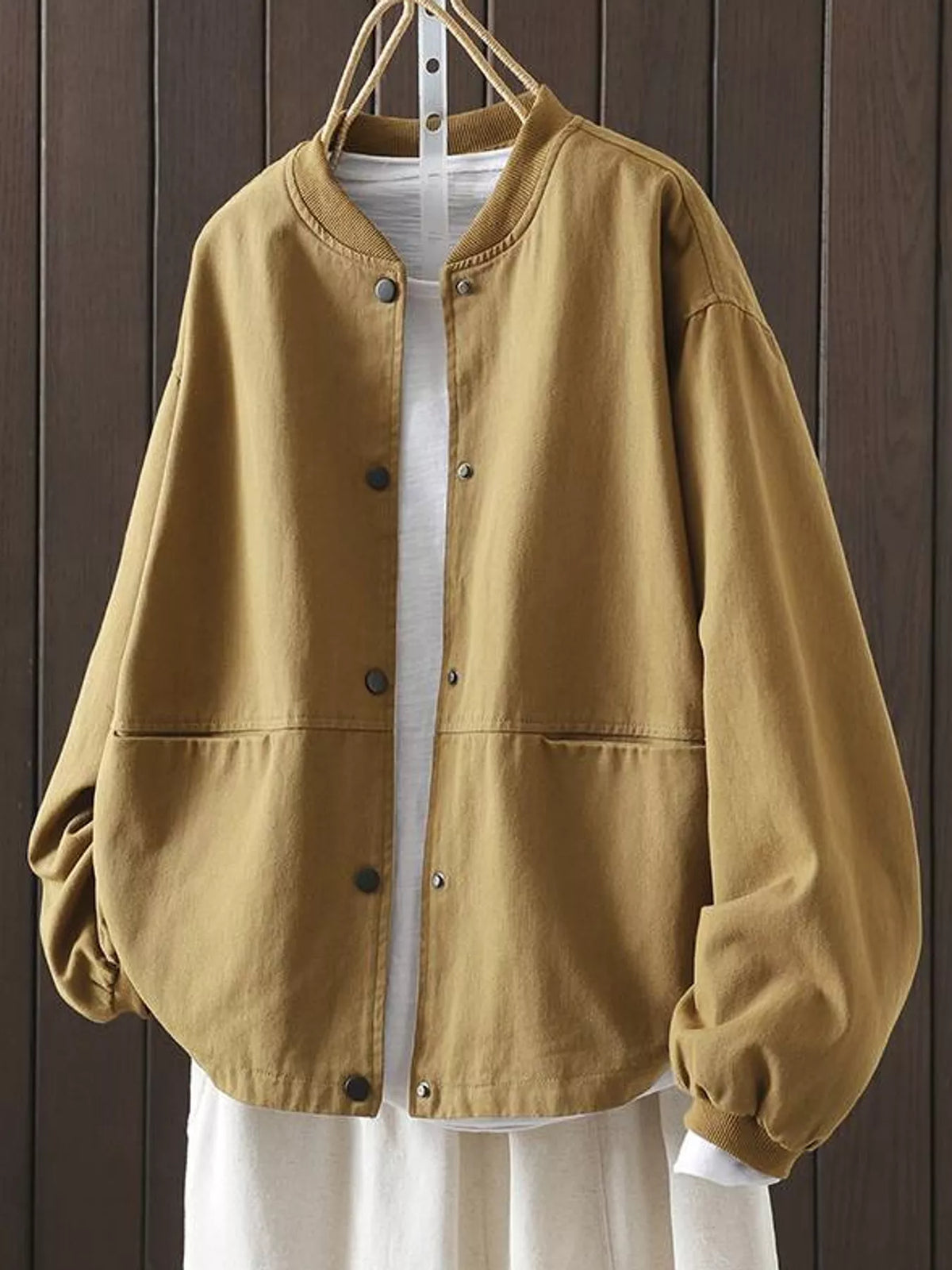 Tan snap front dropped shoulder jacket, front view