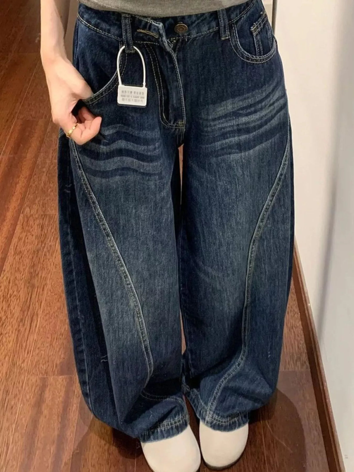 High-Waisted Wide-Leg Asymmetric Seam Vintage Wash Jeans — front view