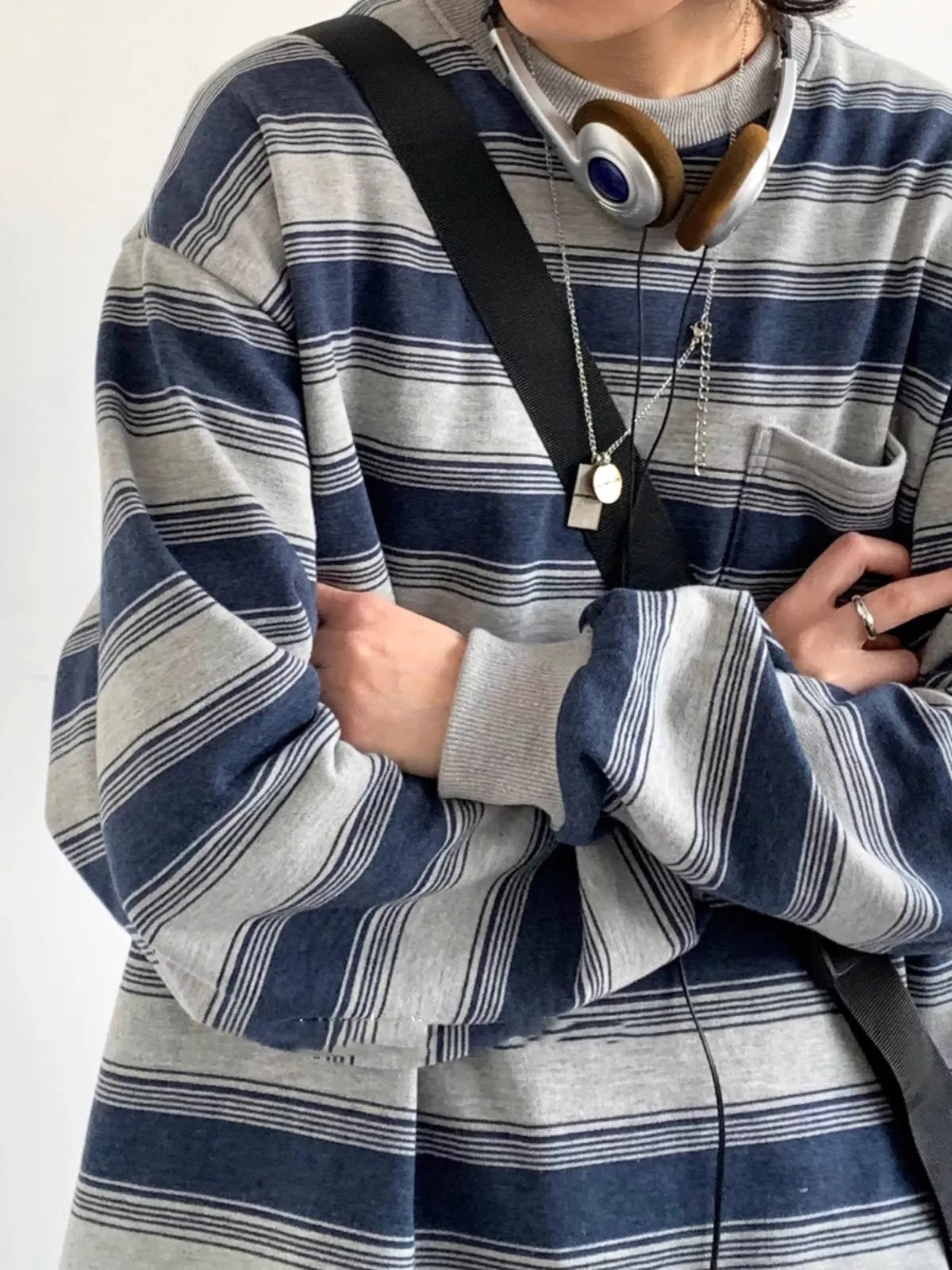 Women's Oversized Striped Crewneck Sweatshirt with Chest Pocket in blue and gray — pocket detail view