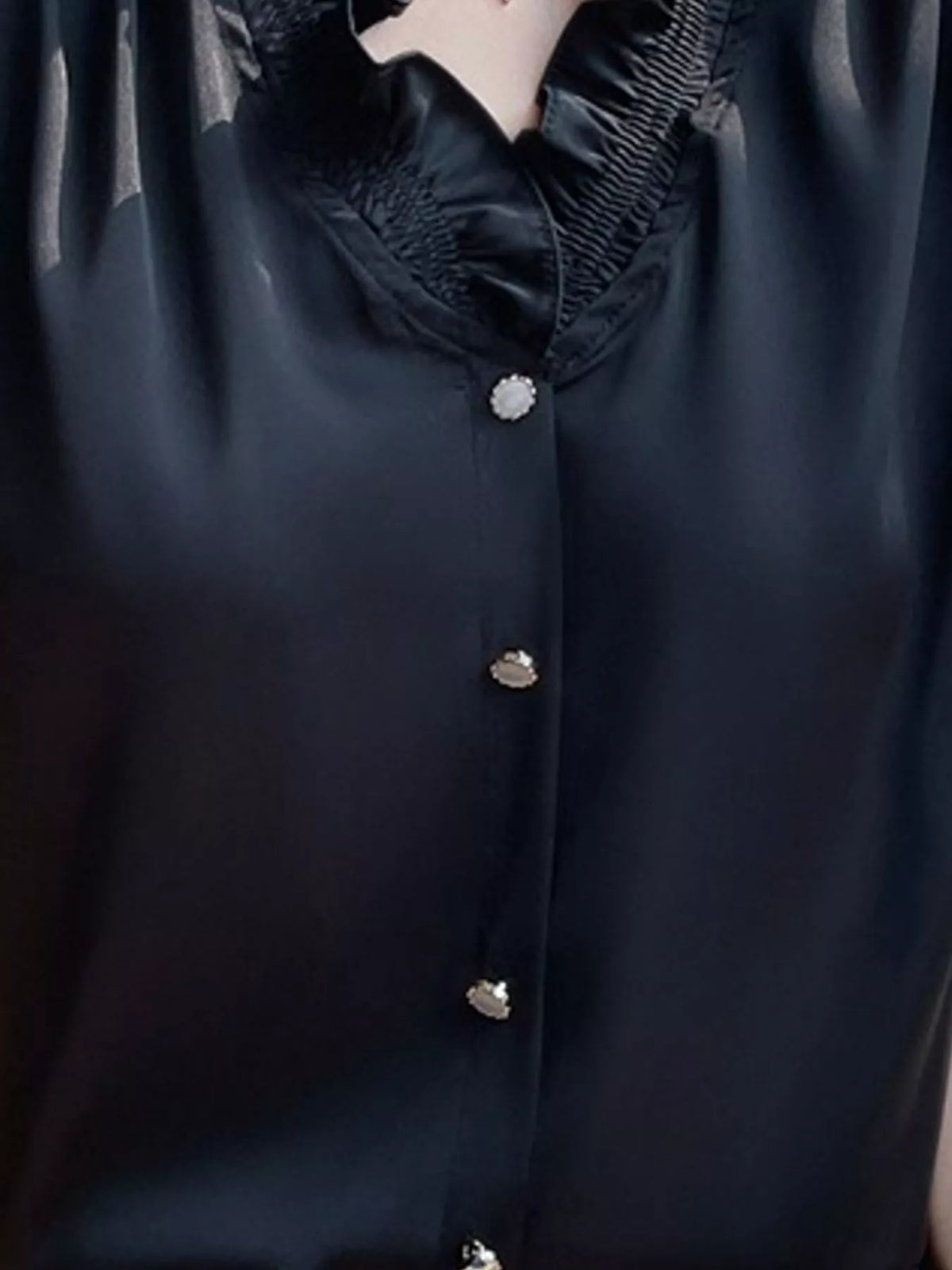 Sleeveless Ruffled V-Neck Satin Shirt — construction details