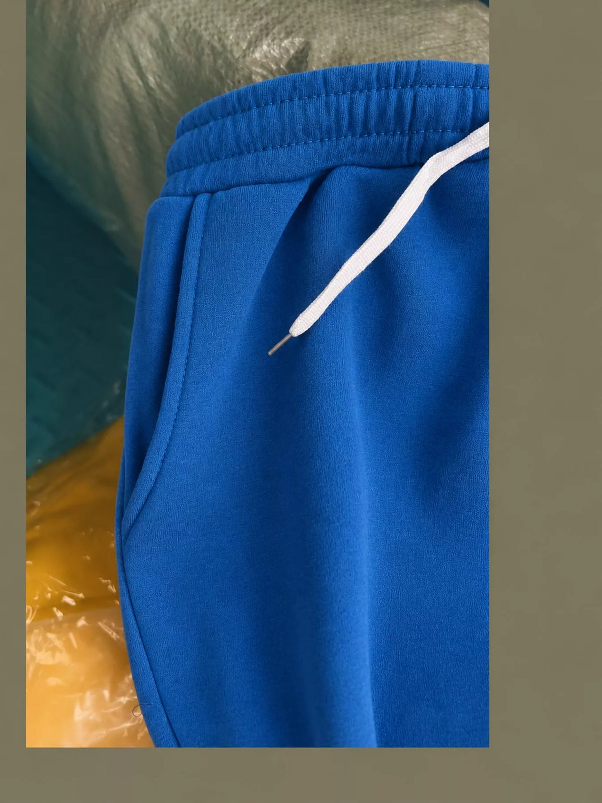 Blue wide-leg pants with drawstring, detail view