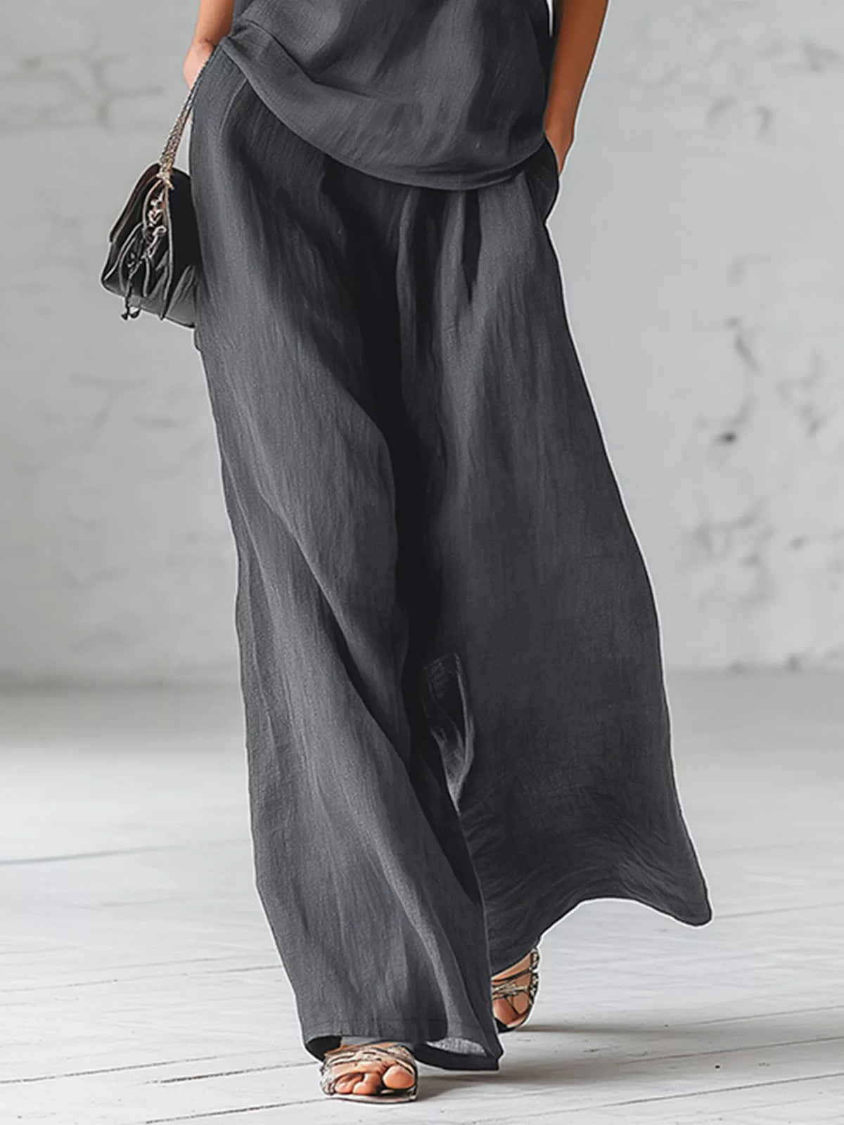 One-Shoulder Bow Top and Wide-Leg Pants Set in black, pants detail