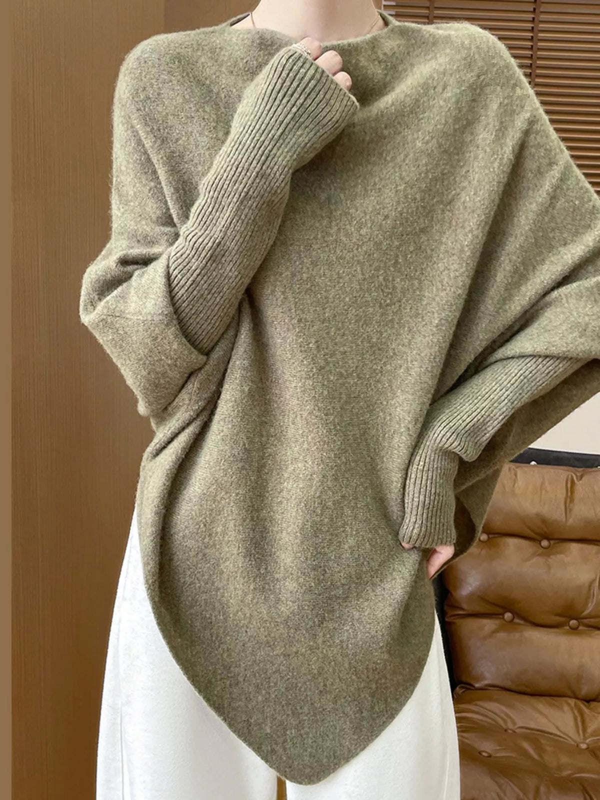 Green asymmetrical lantern sleeve sweater — design and construction details
