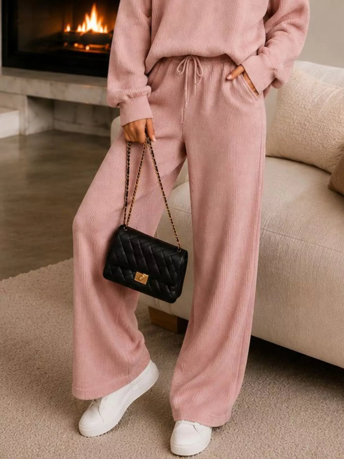 Pink quarter-zip knit top and pants set, pants detail