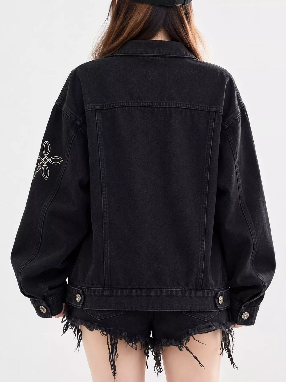 Black oversized button up denim jacket, back view