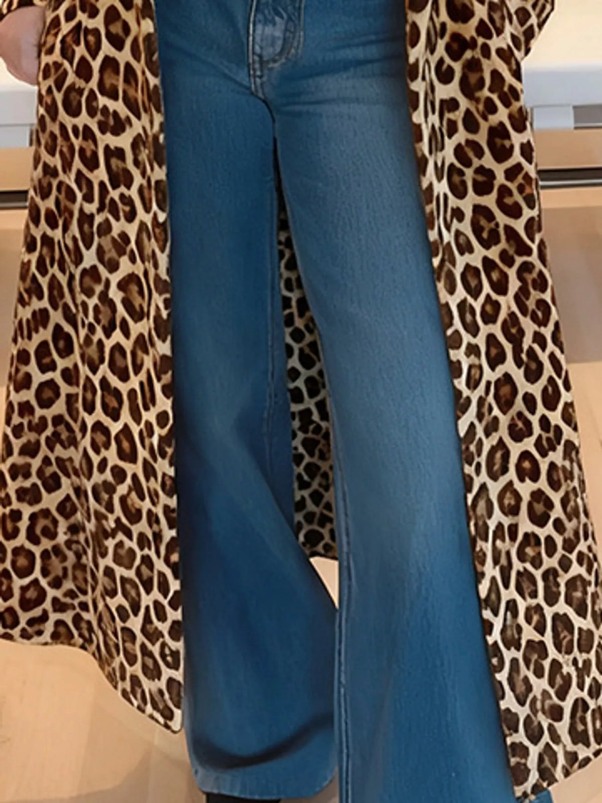Leopard-print long-sleeve coat, garment detail