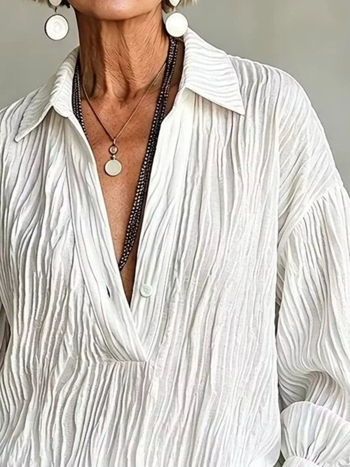 White textured blouse, collared neckline and textured front