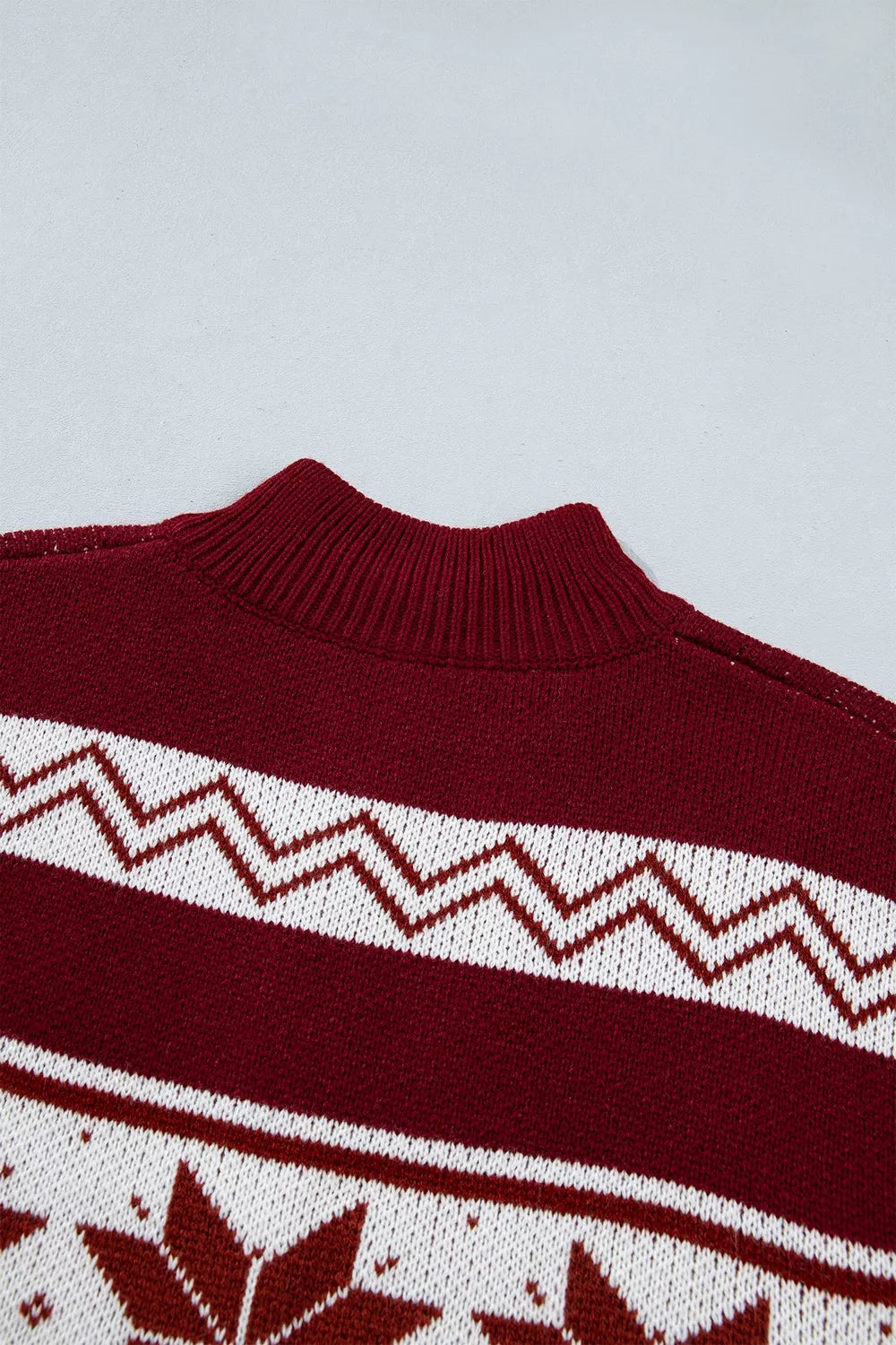 Geometric zip-up knit long sleeve cardigan