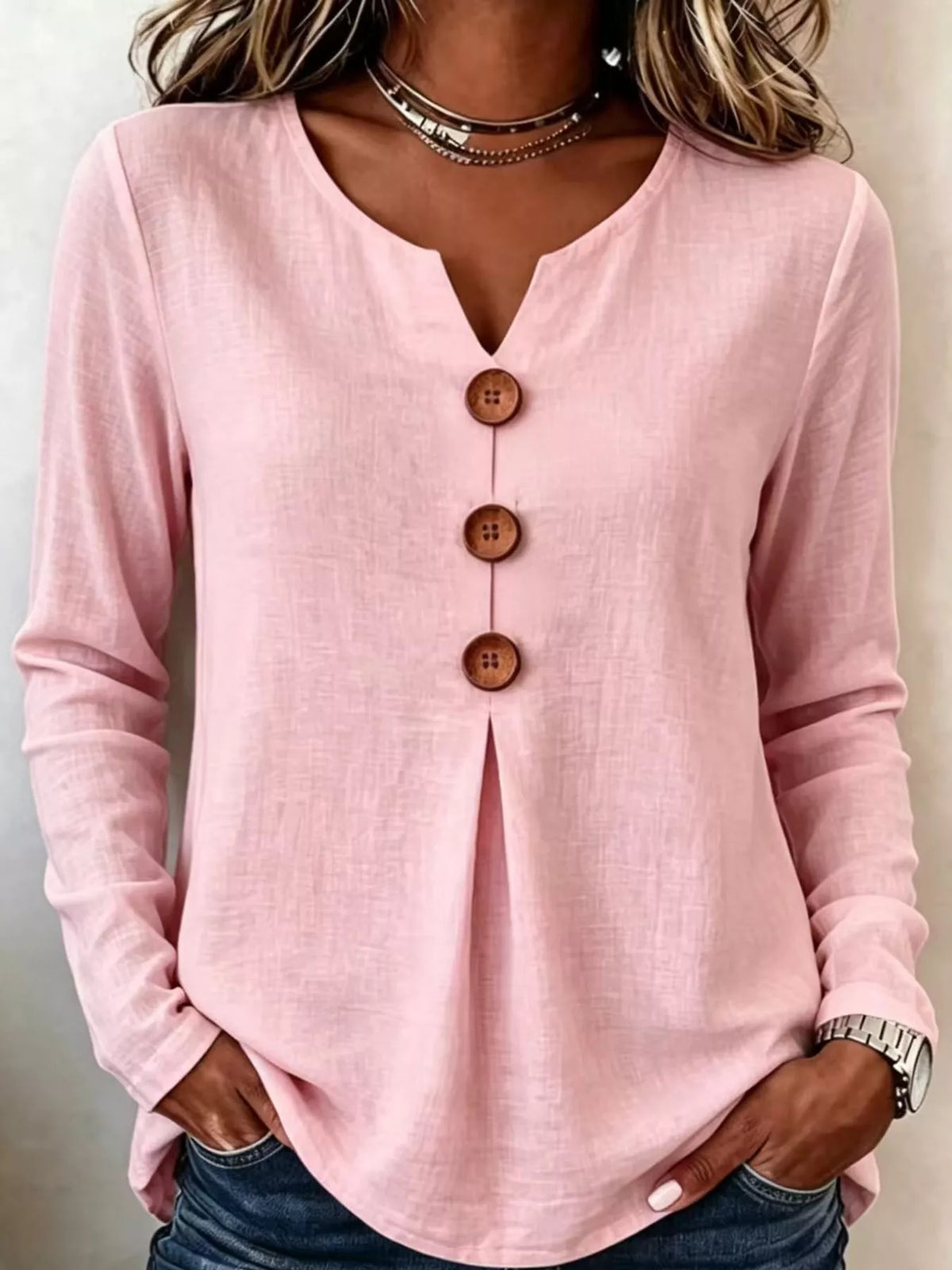 Pink long sleeve decorative button blouse