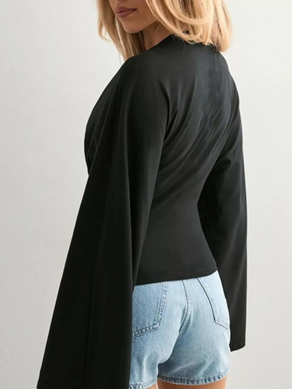 Black Solid Long Sleeve Crew Neck Stretch T-Shirt back three-quarter view