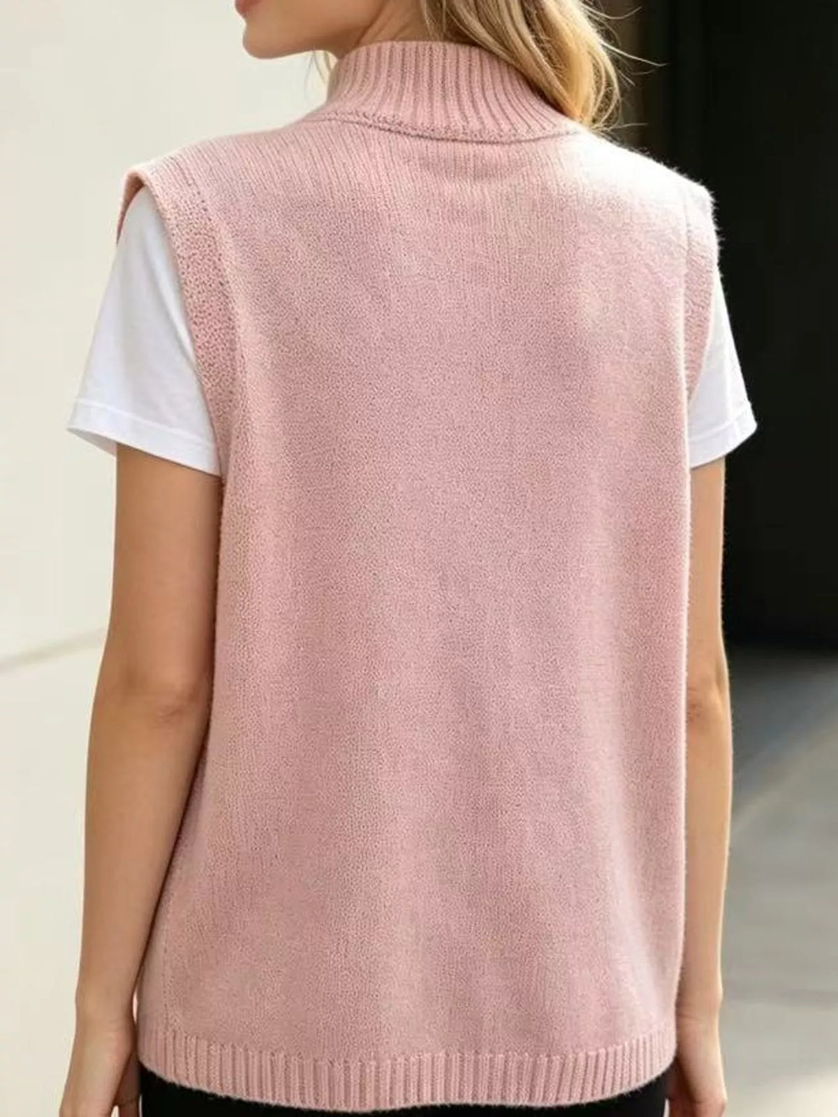 Mock Neck Asymmetrical Hem Knit Sweater Vest, back view in pink