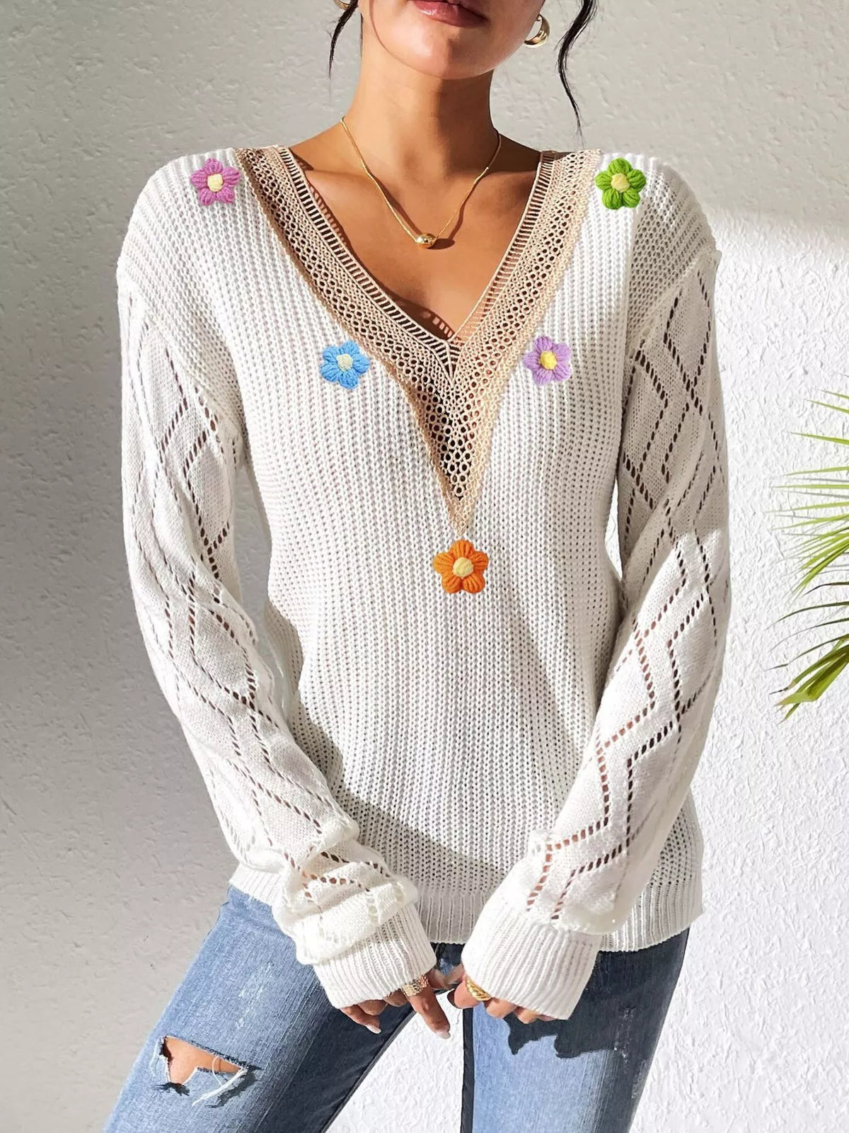 White Floral Applique V-Neck Openwork Sweater close-up view