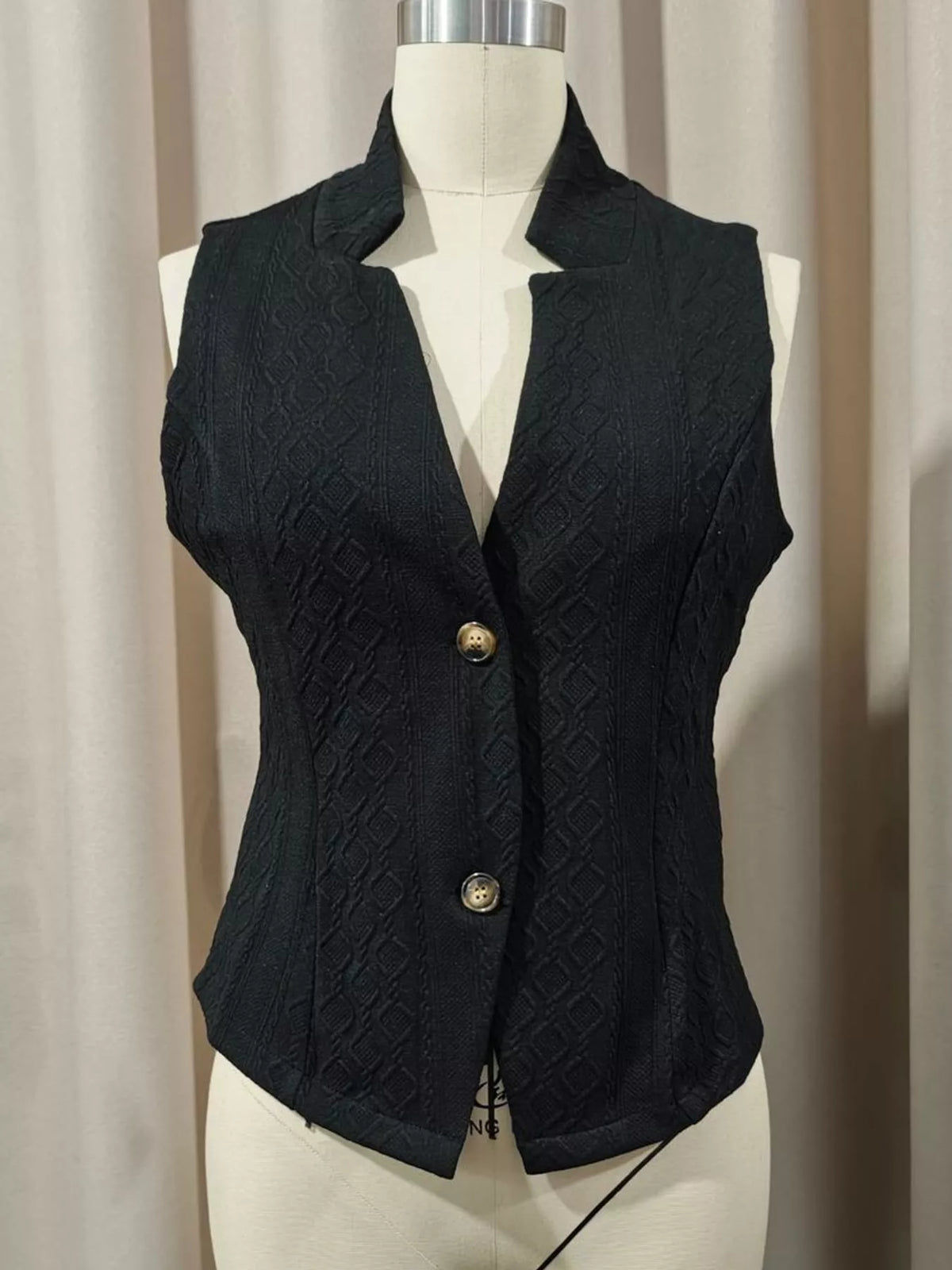 Textured Button-Down Vest in black, front view