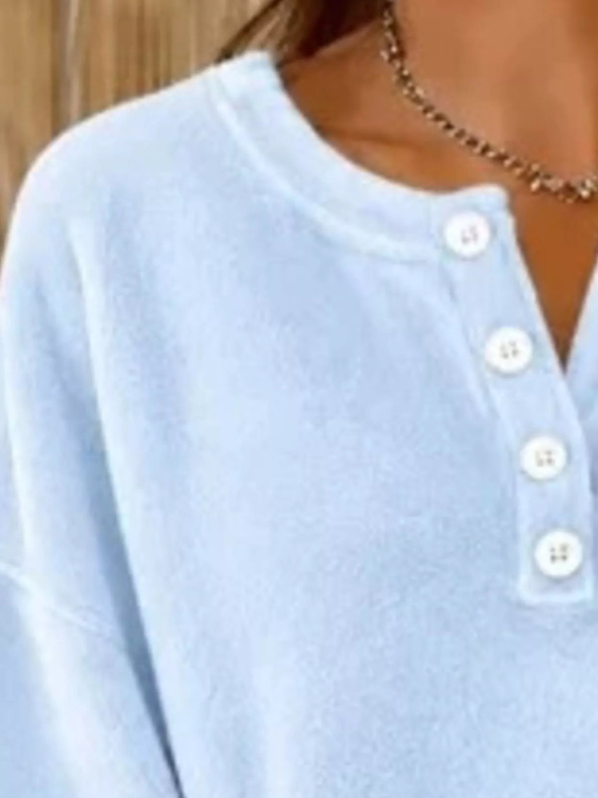 Light blue button-detail dropped shoulder sweatshirt, button placket detail
