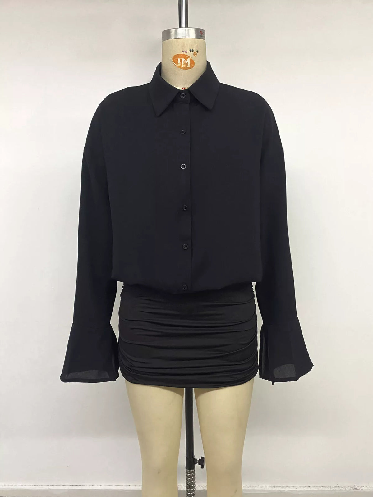 Black flounce sleeve ruched mini shirt dress, front on mannequin