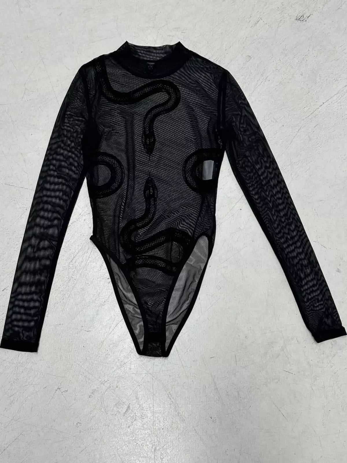 Black sheer mesh snake-motif bodysuit