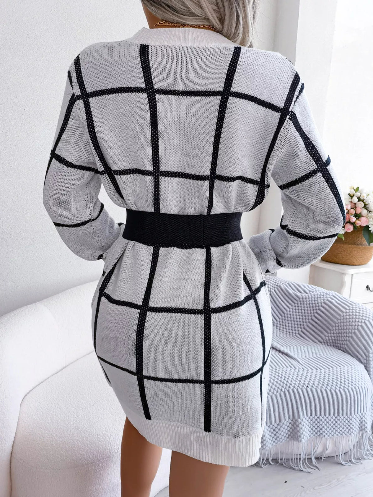 White windowpane long-sleeve sweater dress, belted back view.