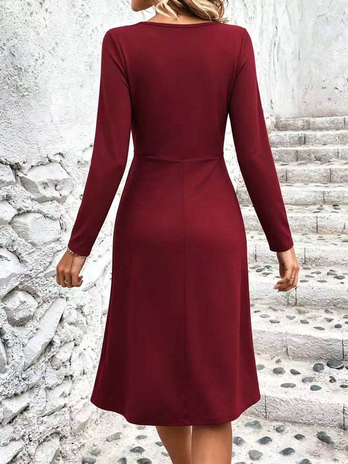 Burgundy long sleeve ruched-front midi dress, back view