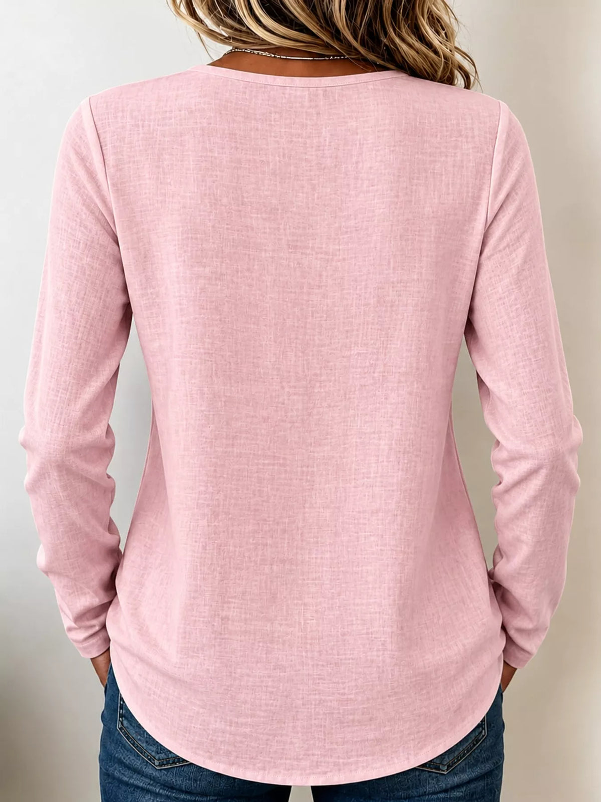 Pink long sleeve decorative button blouse, back view