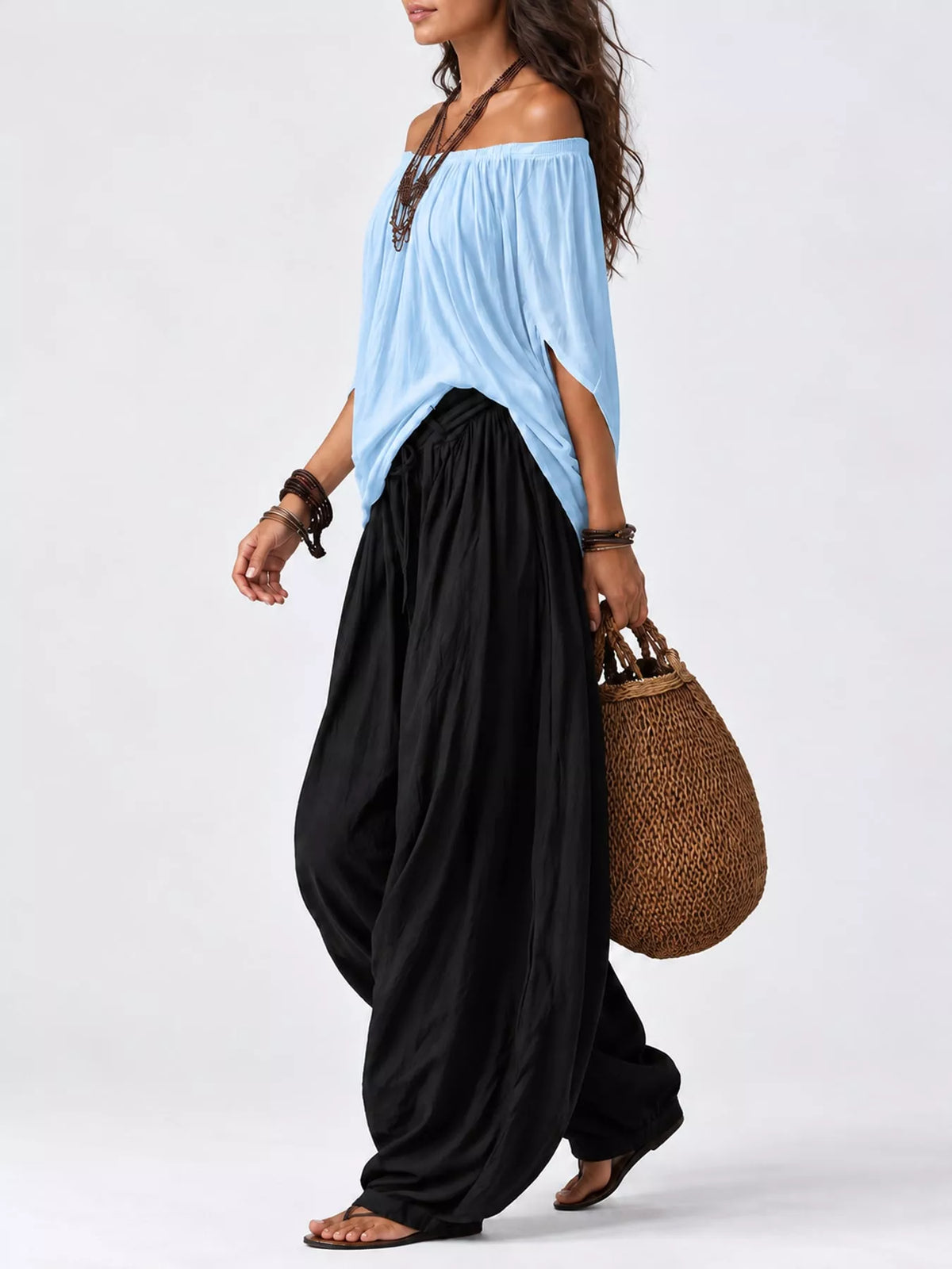 Light blue top and black pants off-shoulder top and wide-leg harem pants set — side view