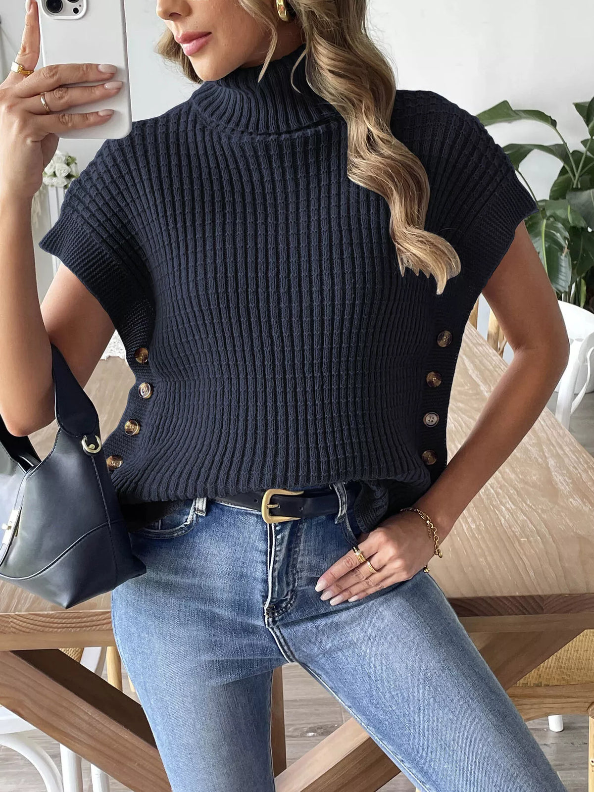 Navy ribbed turtleneck side-button sweater, front view partially tucked.