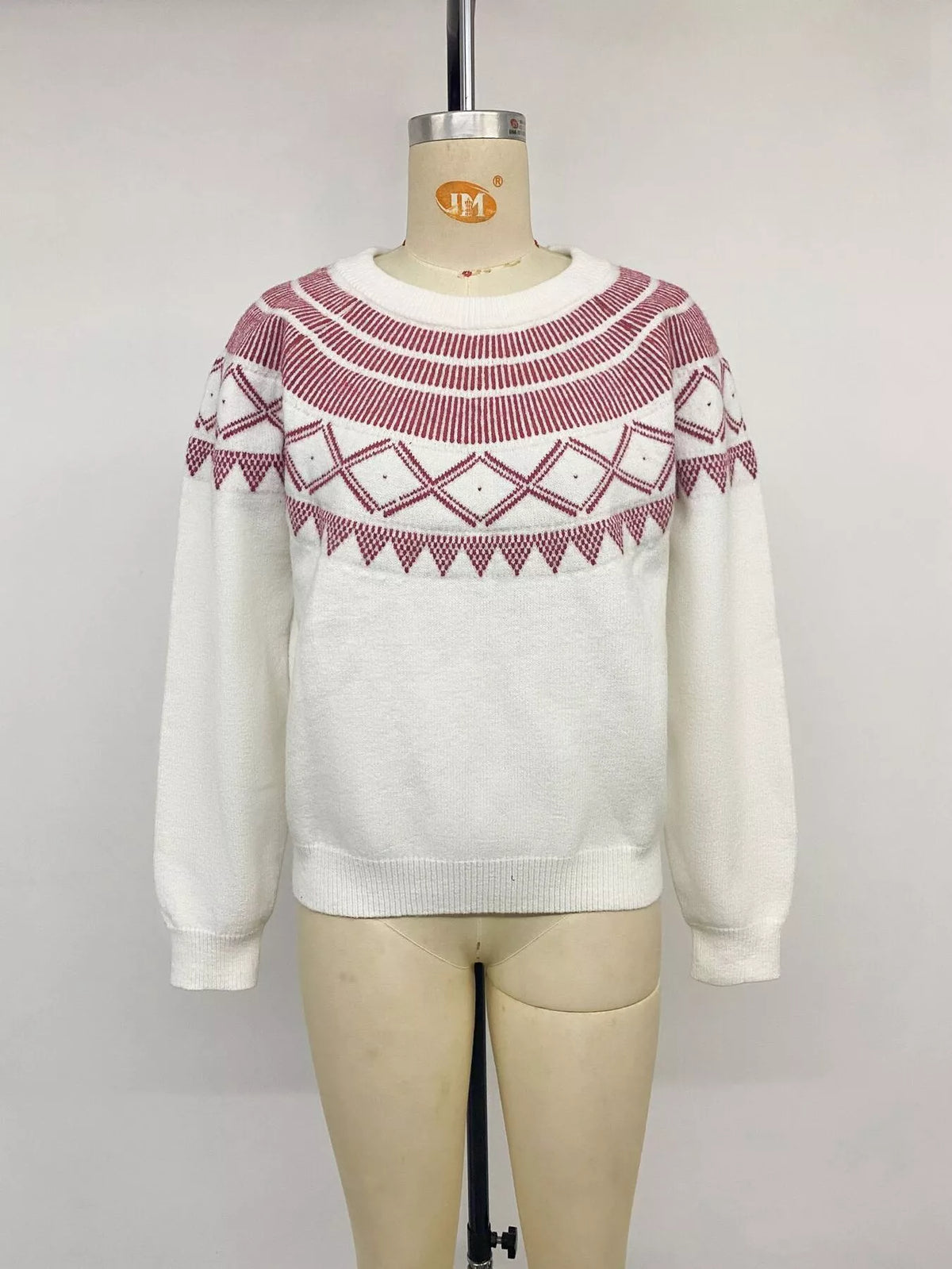 Cream geometric crew neck sweater, front on mannequin