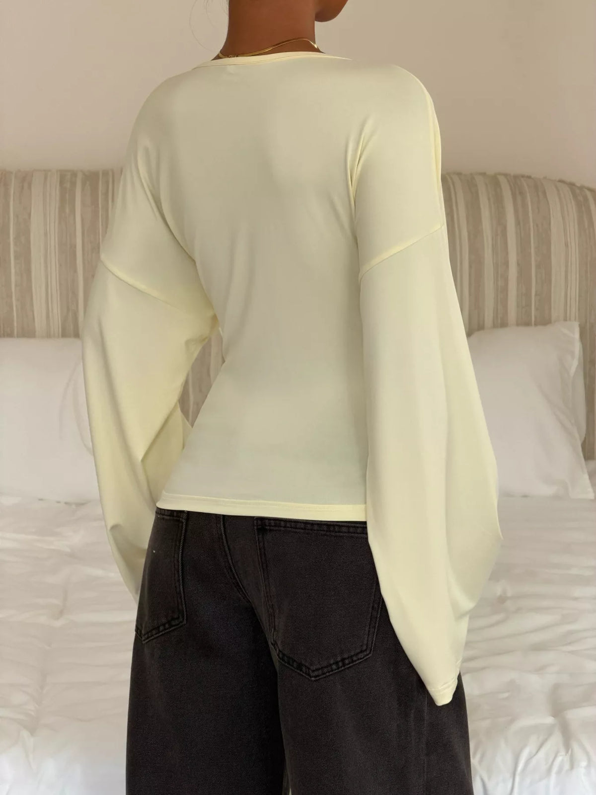 V-Neck Flare Sleeve T-Shirt in yellow, back view