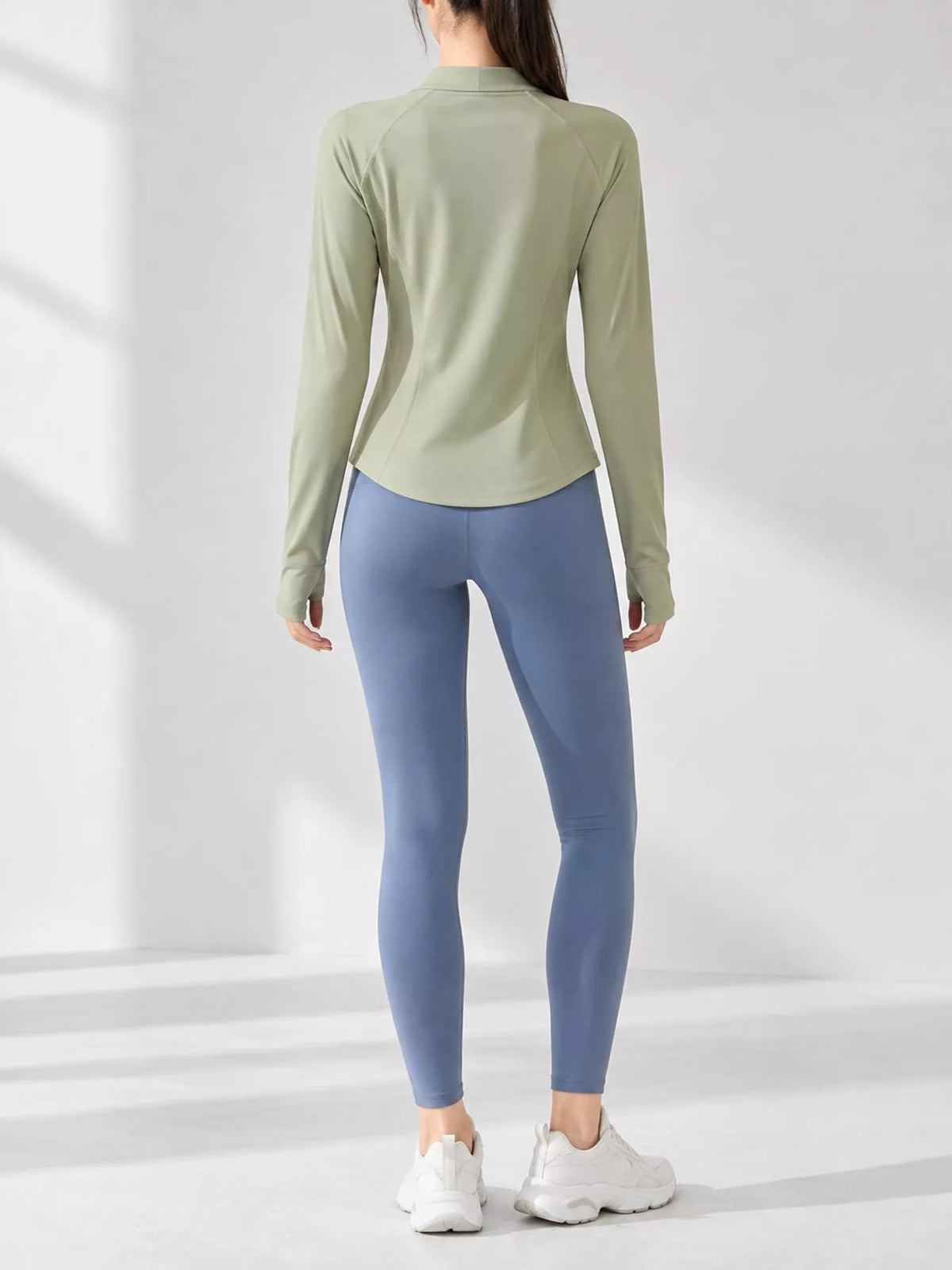 Green quick-dry zip-up jacket, back view