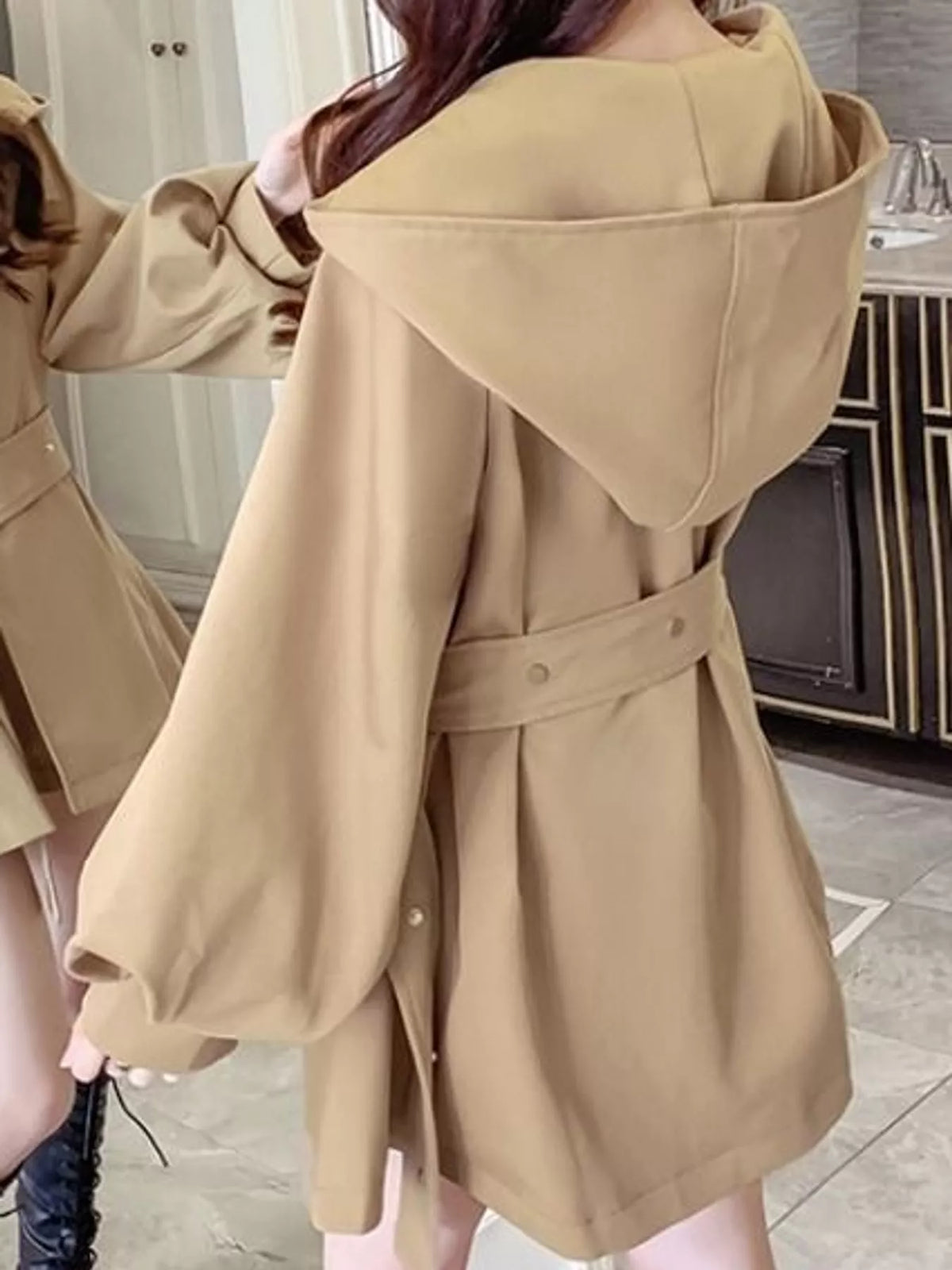 Lantern sleeve hooded belted jacket, back view