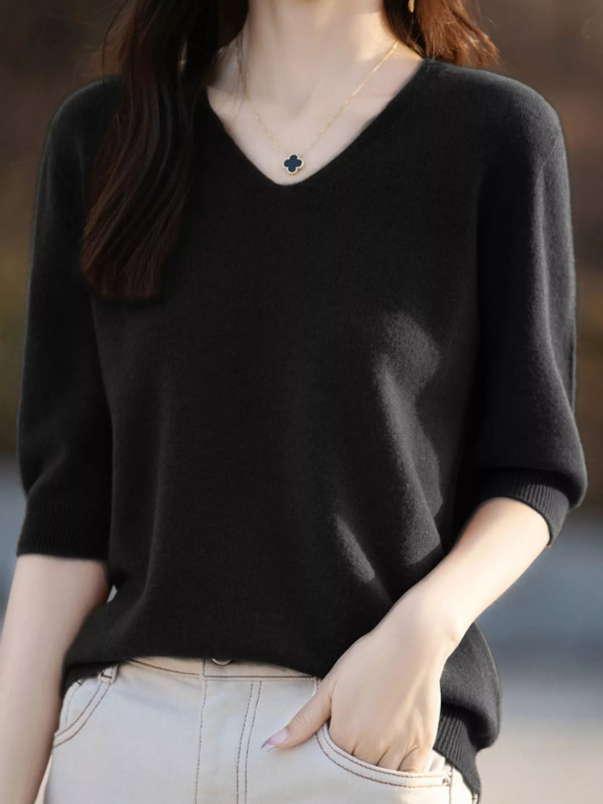 Black short-sleeve sweater