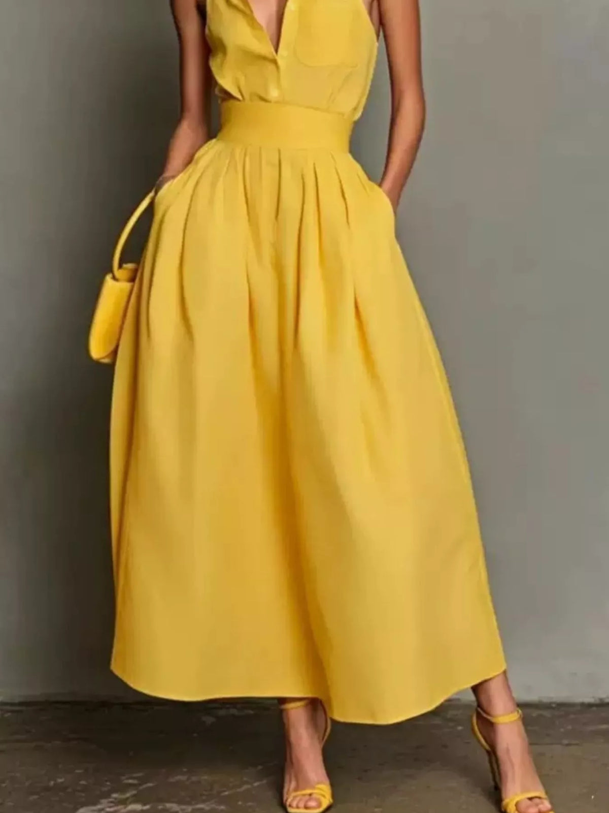 Yellow halter-collar A-line midi dress, skirt detail