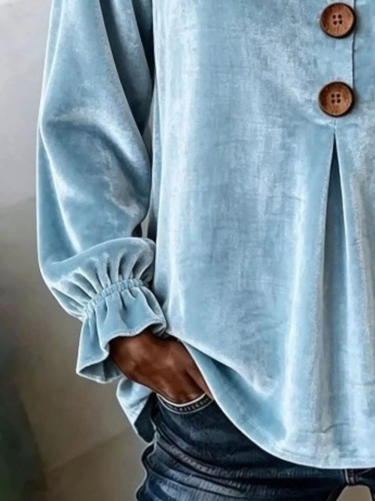 Light blue velvet balloon-sleeve blouse, cuff and button detail