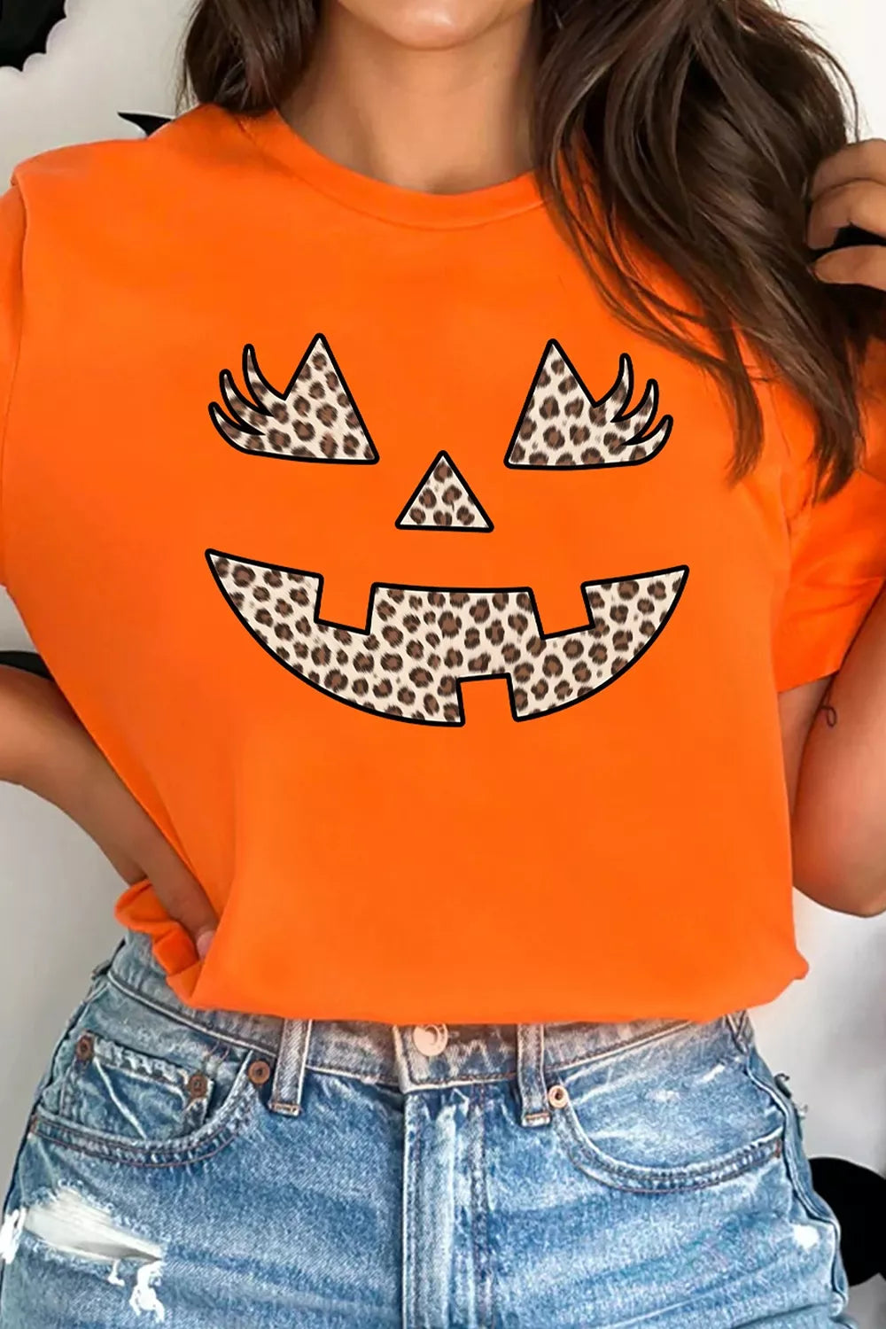 Women's Halloween Pumpkin Face Leopard Graphic T-Shirt in Orange, detail view