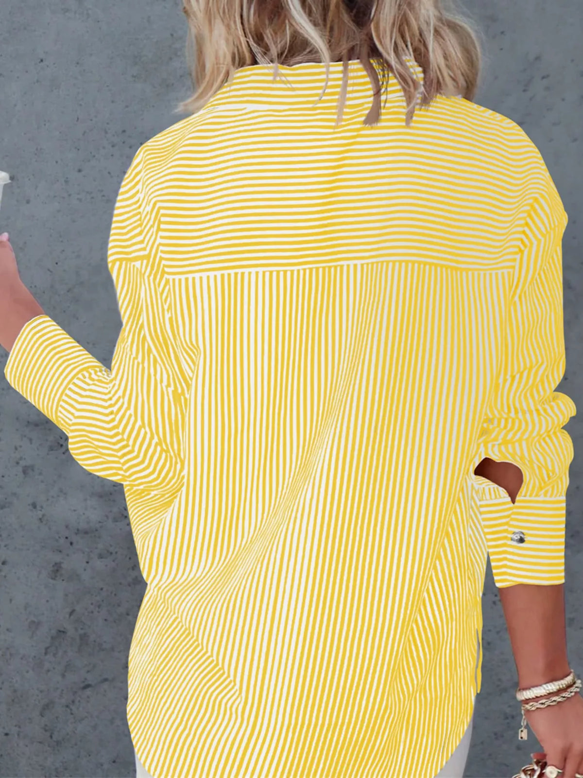 Yellow striped button-down shirt, back view