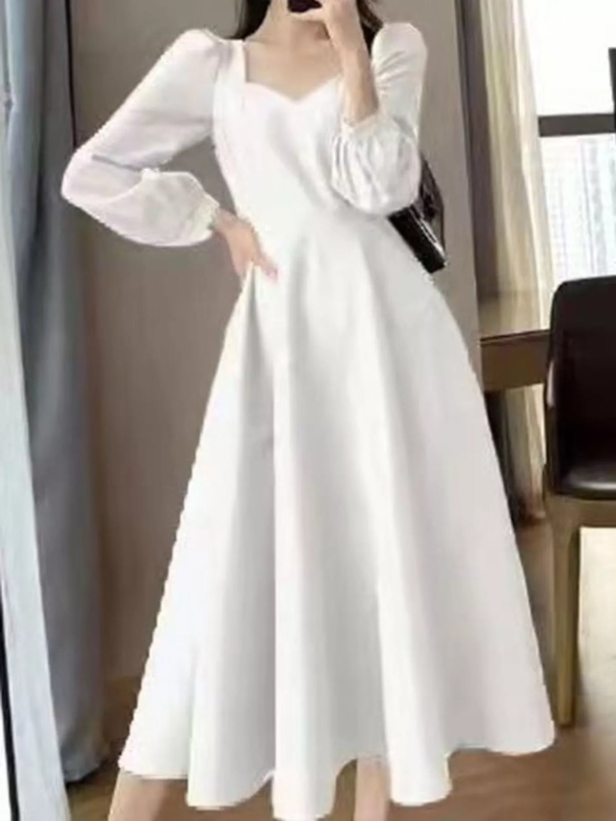 White long sleeve a line midi dress, front view