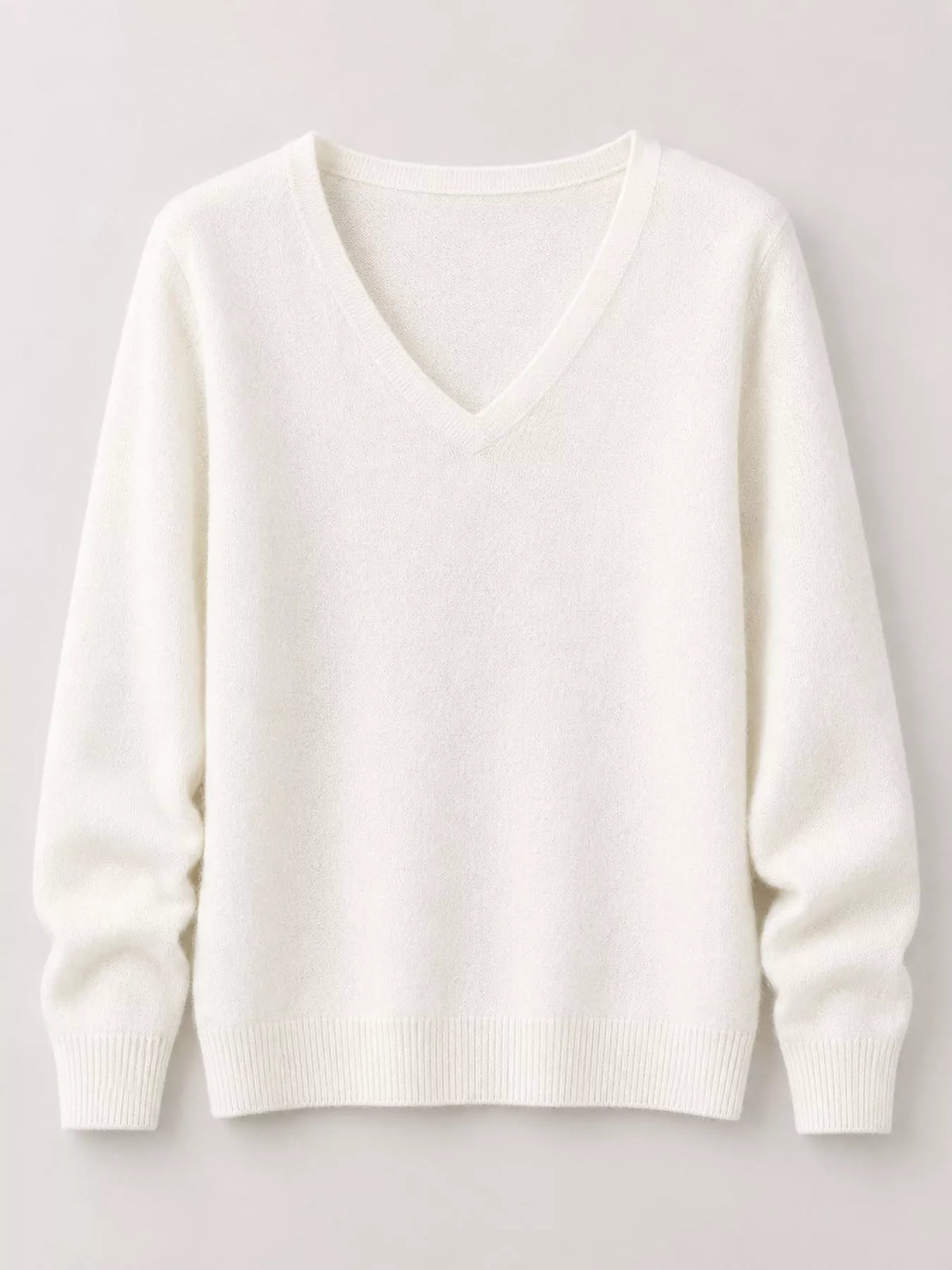 White v-neck long sleeve knit top