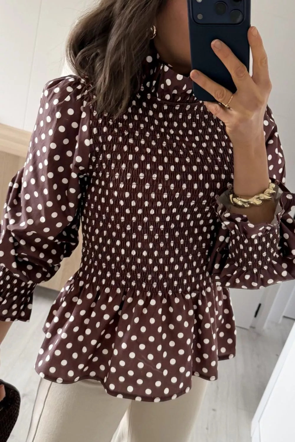 Brown polka dot polka dot high neck ruffled peplum blouse — front view
