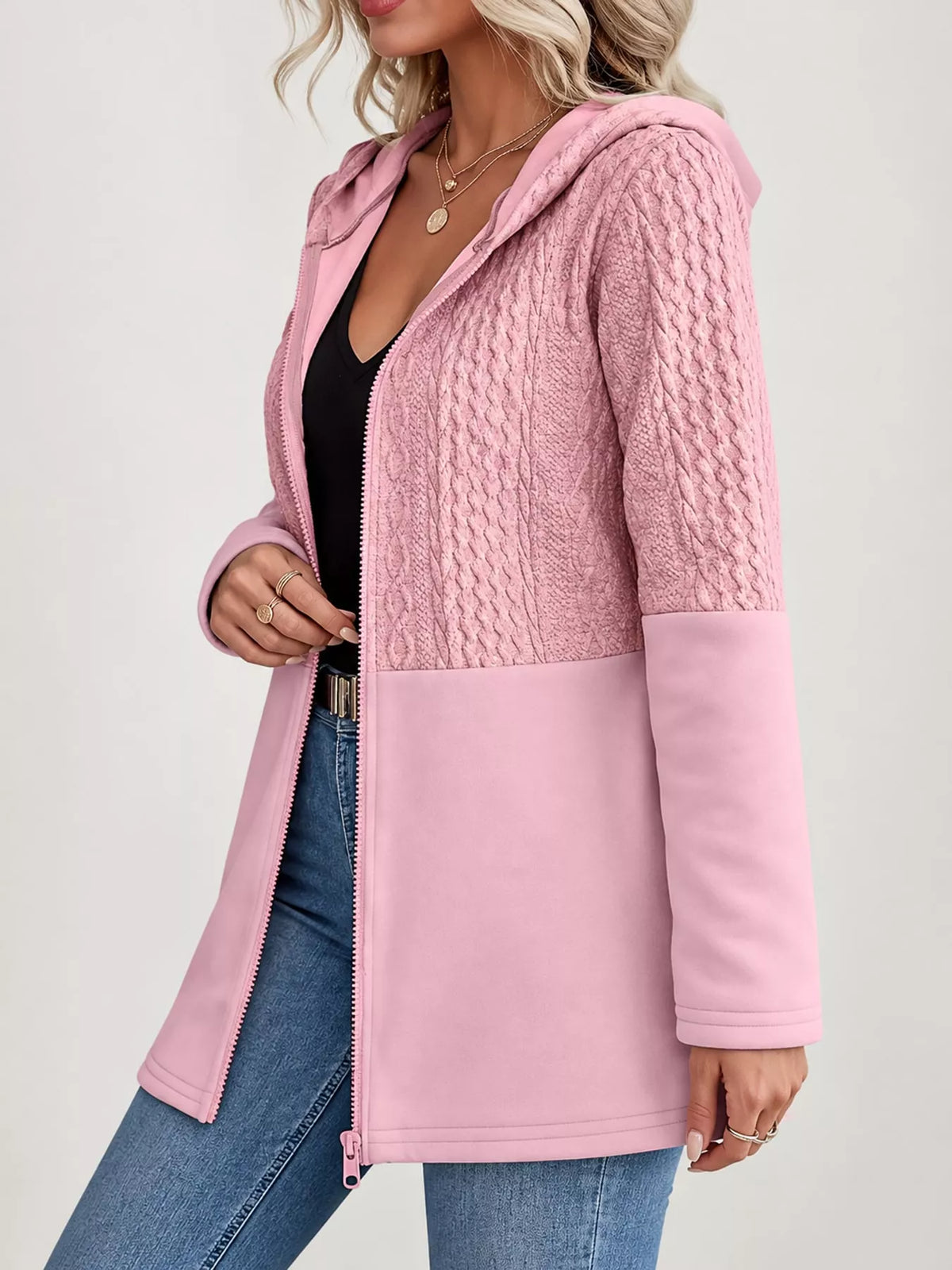 Pink hooded zip-up jacket, side view