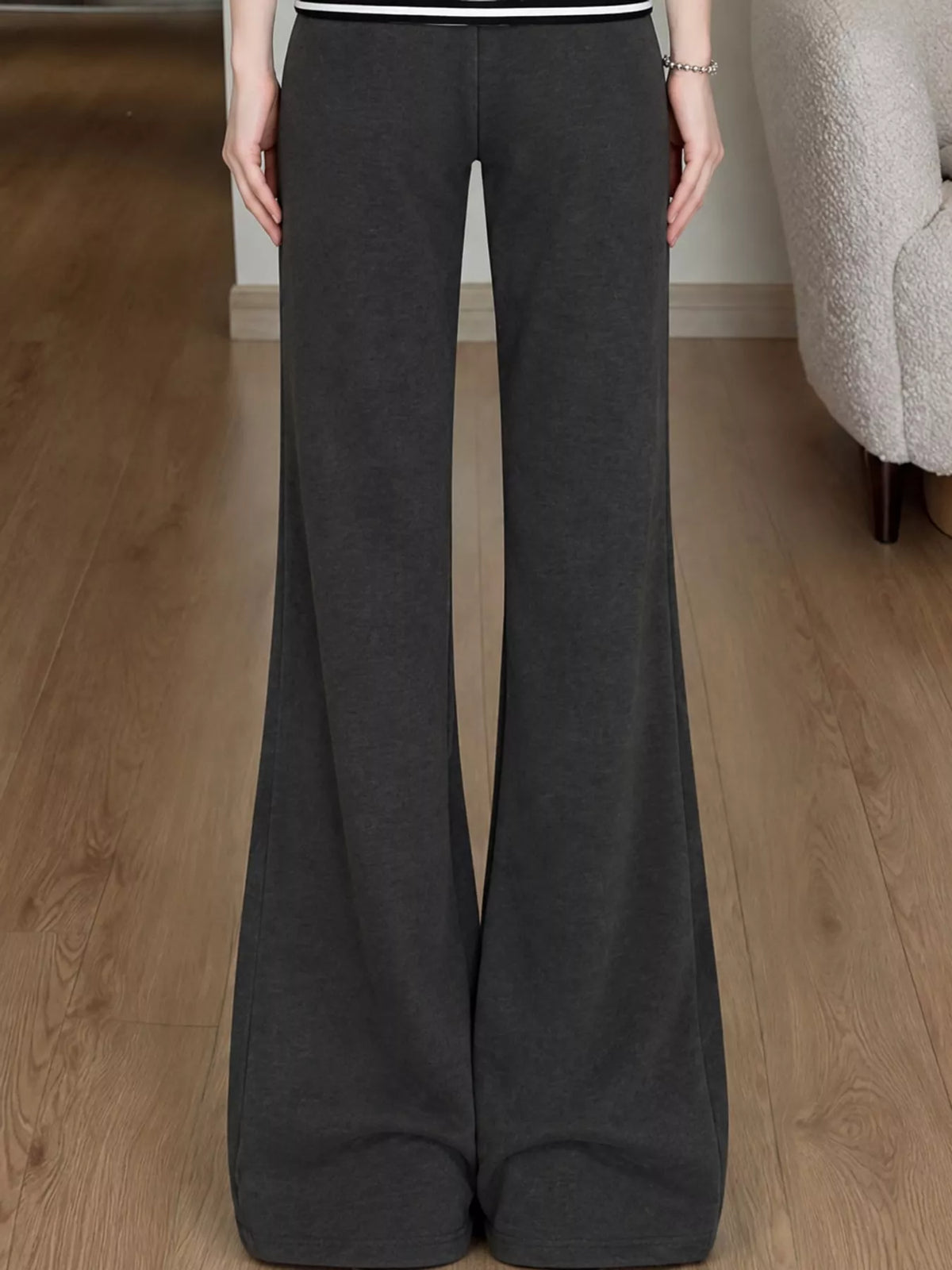 Dark gray high waisted wide leg drawstring pants, back view