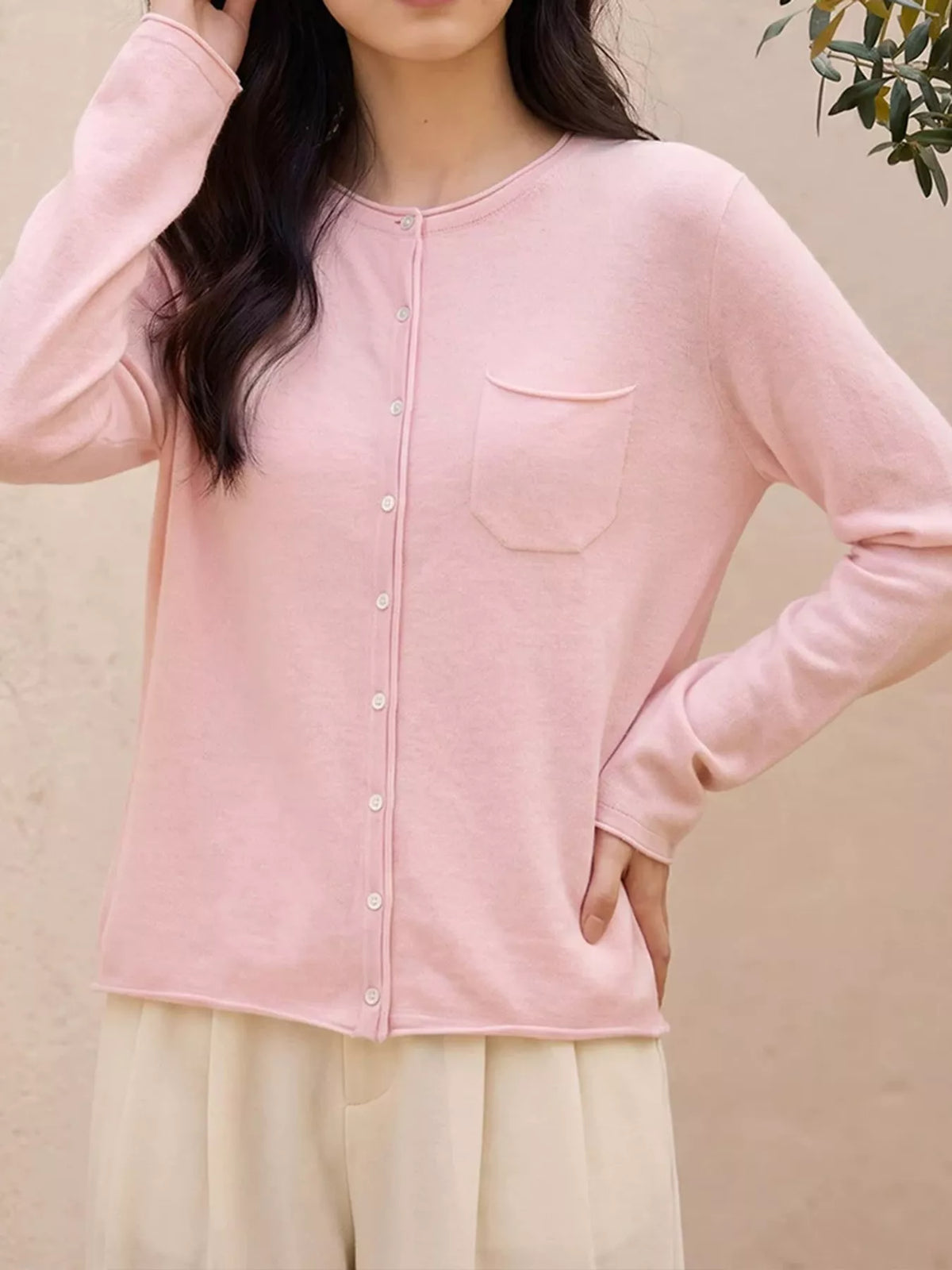 Round neck long sleeve cardigan, front view on model