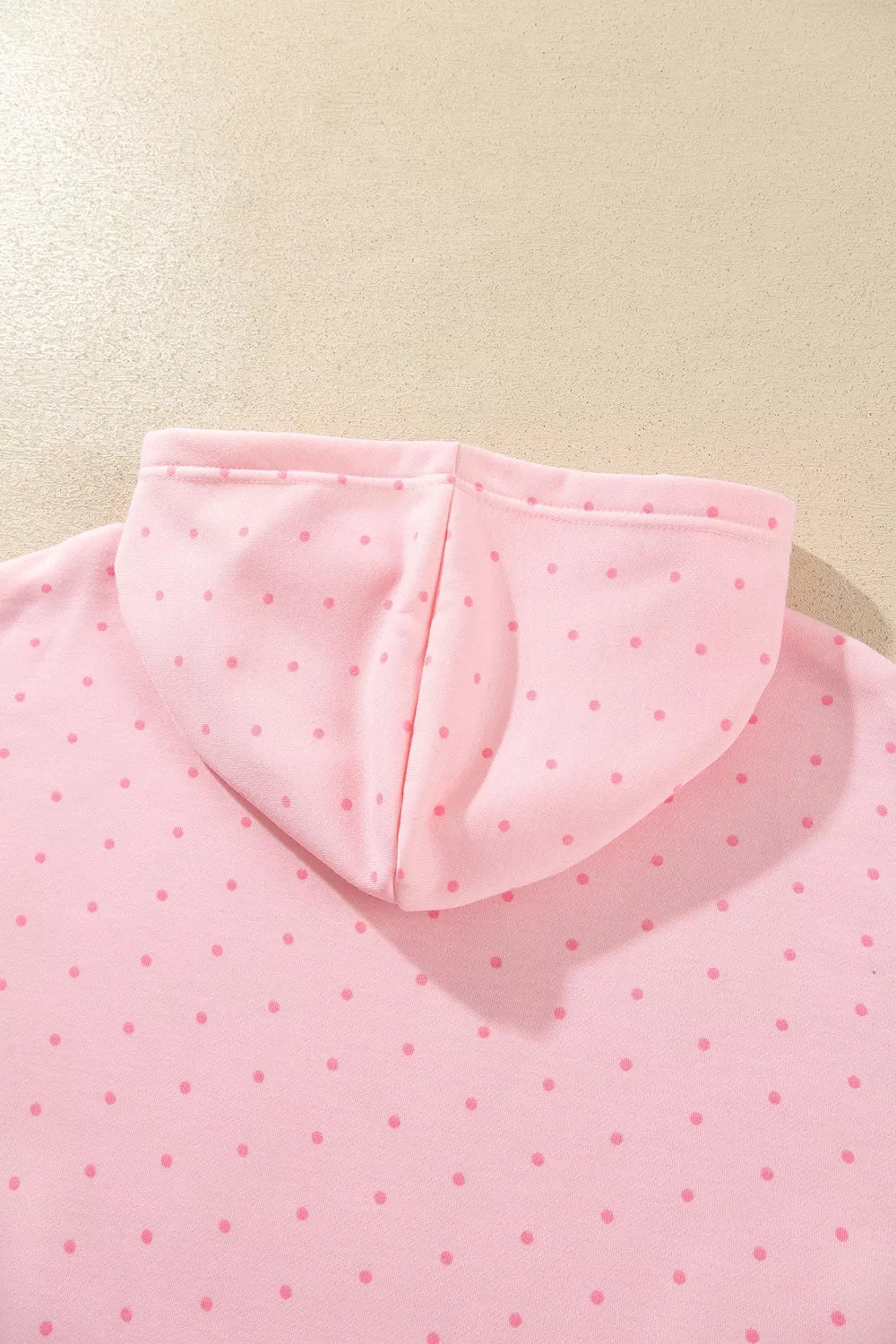 Pink polka dot oversized hoodie and shorts set — design and construction details
