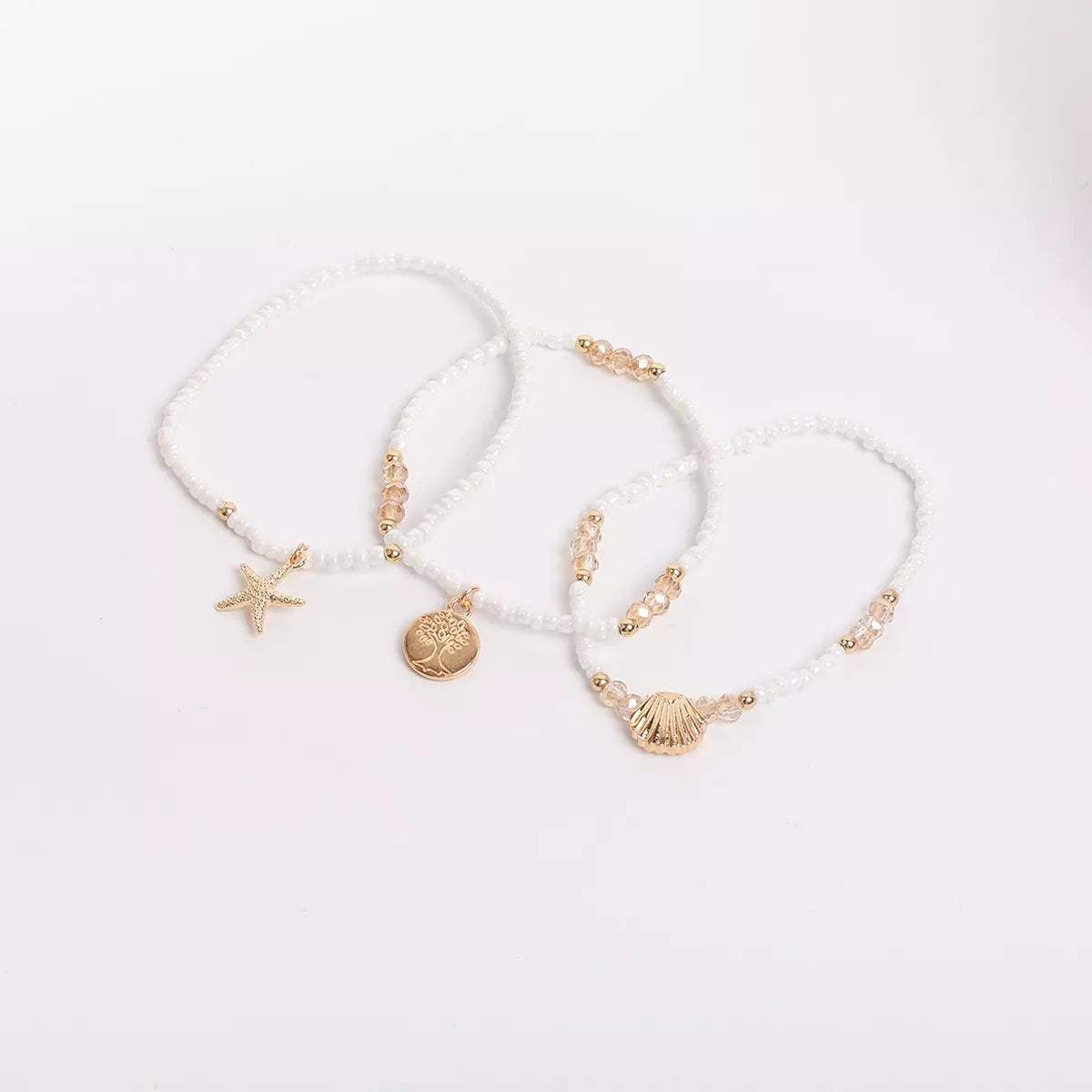 Gold-tone and pearl three-piece beaded anklet set
