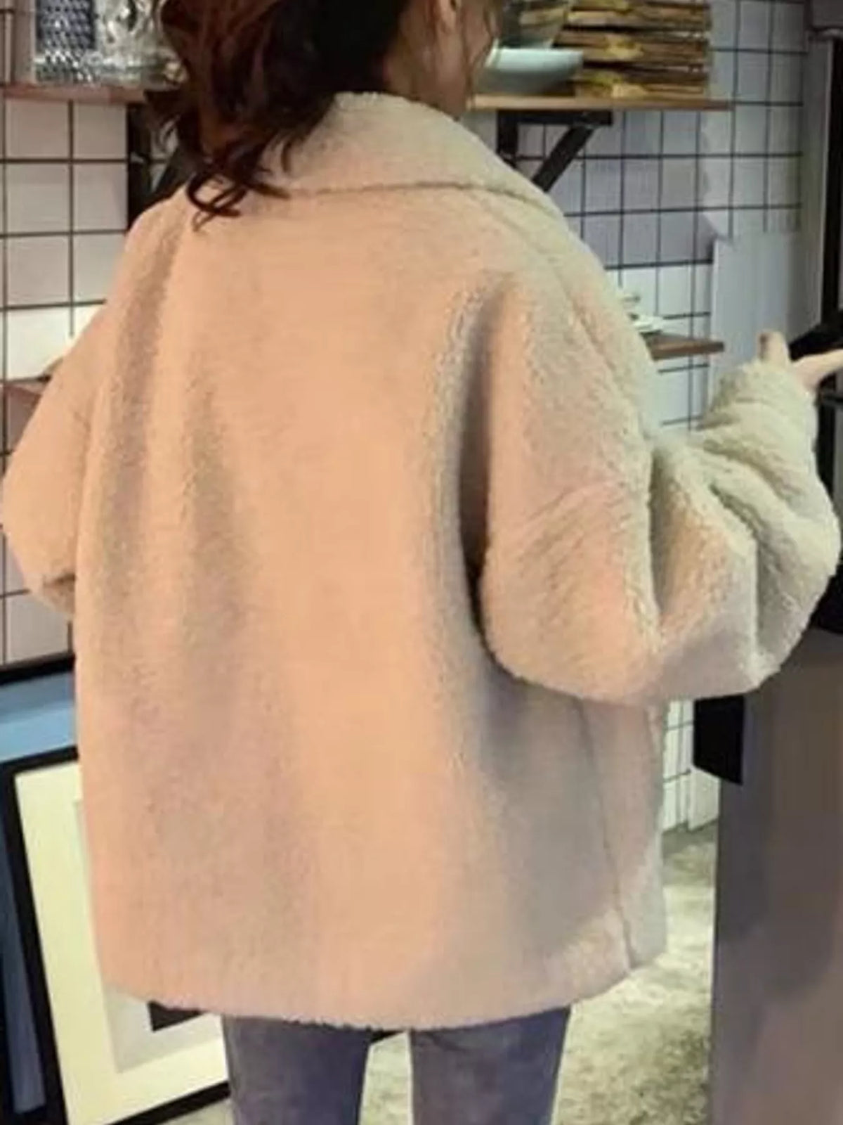 Beige button-down teddy jacket — back view