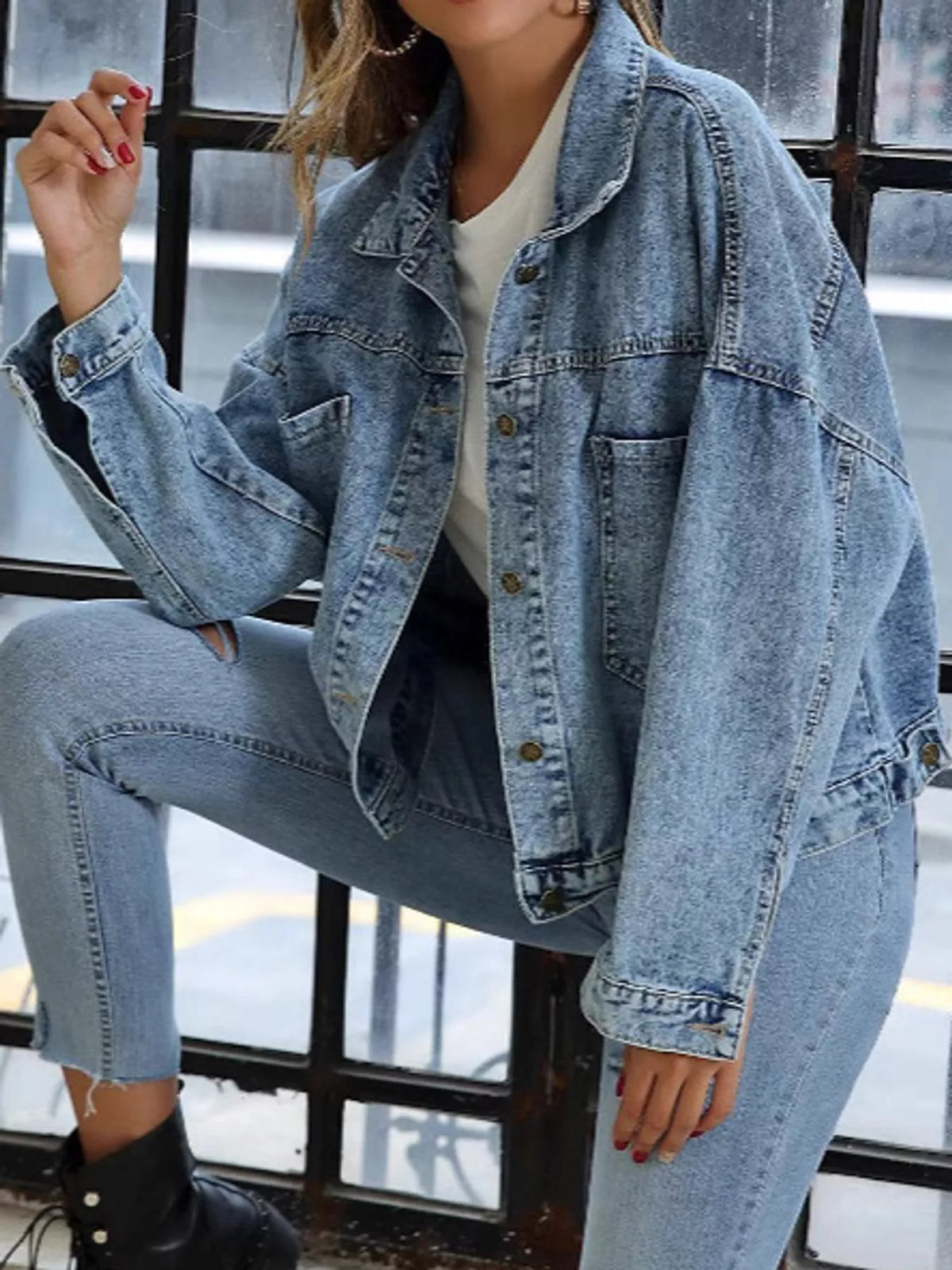 Blue button-up dropped shoulder denim jacket — front view
