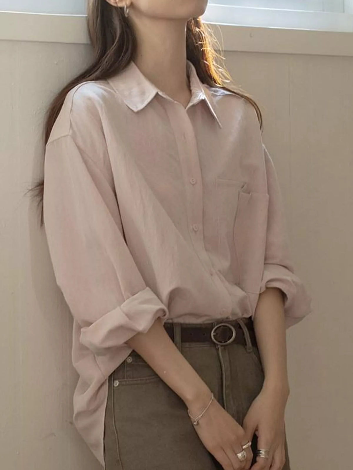 Pink button down long sleeve shirt, front view