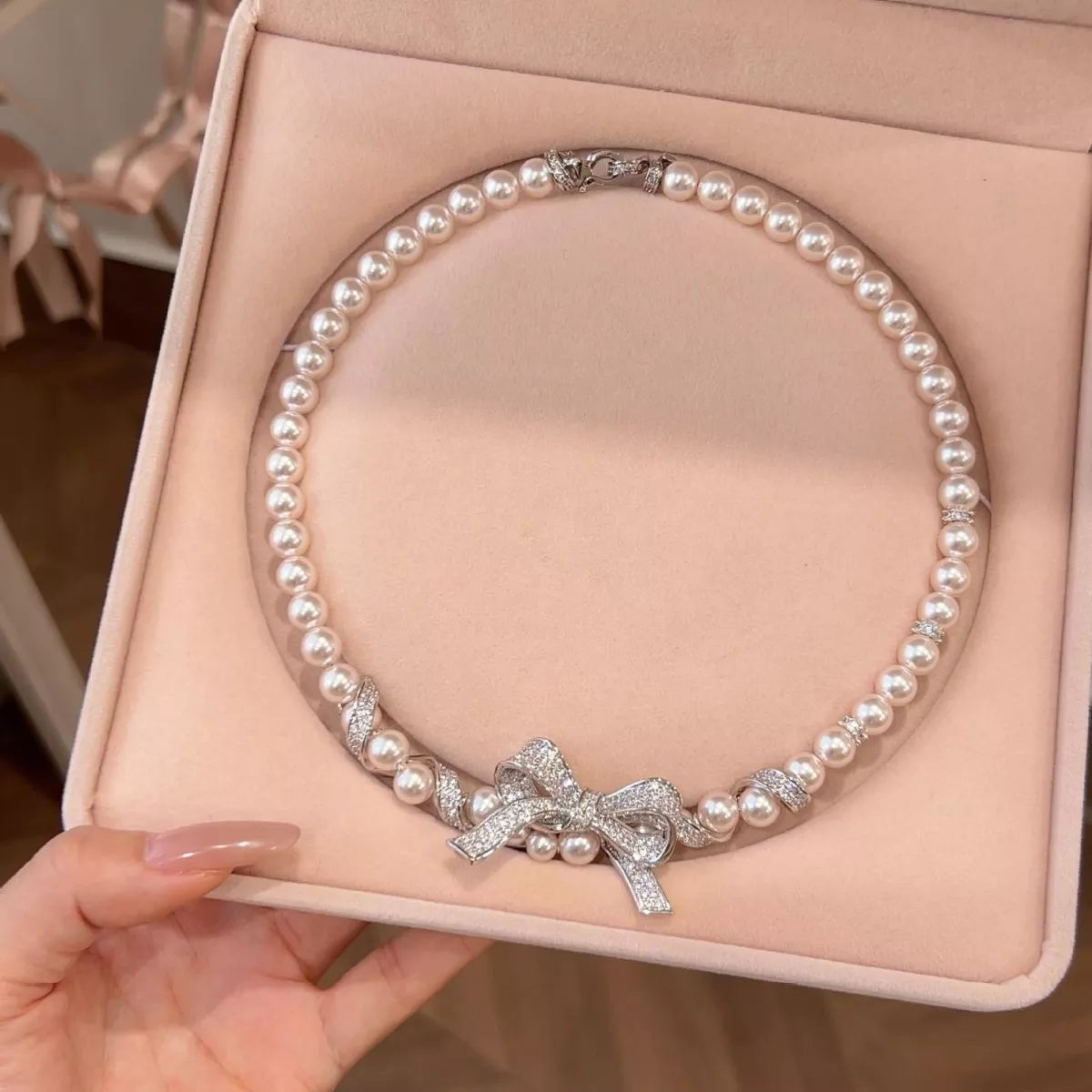 Trendsi Pearl Necklace with Bow Pendant -